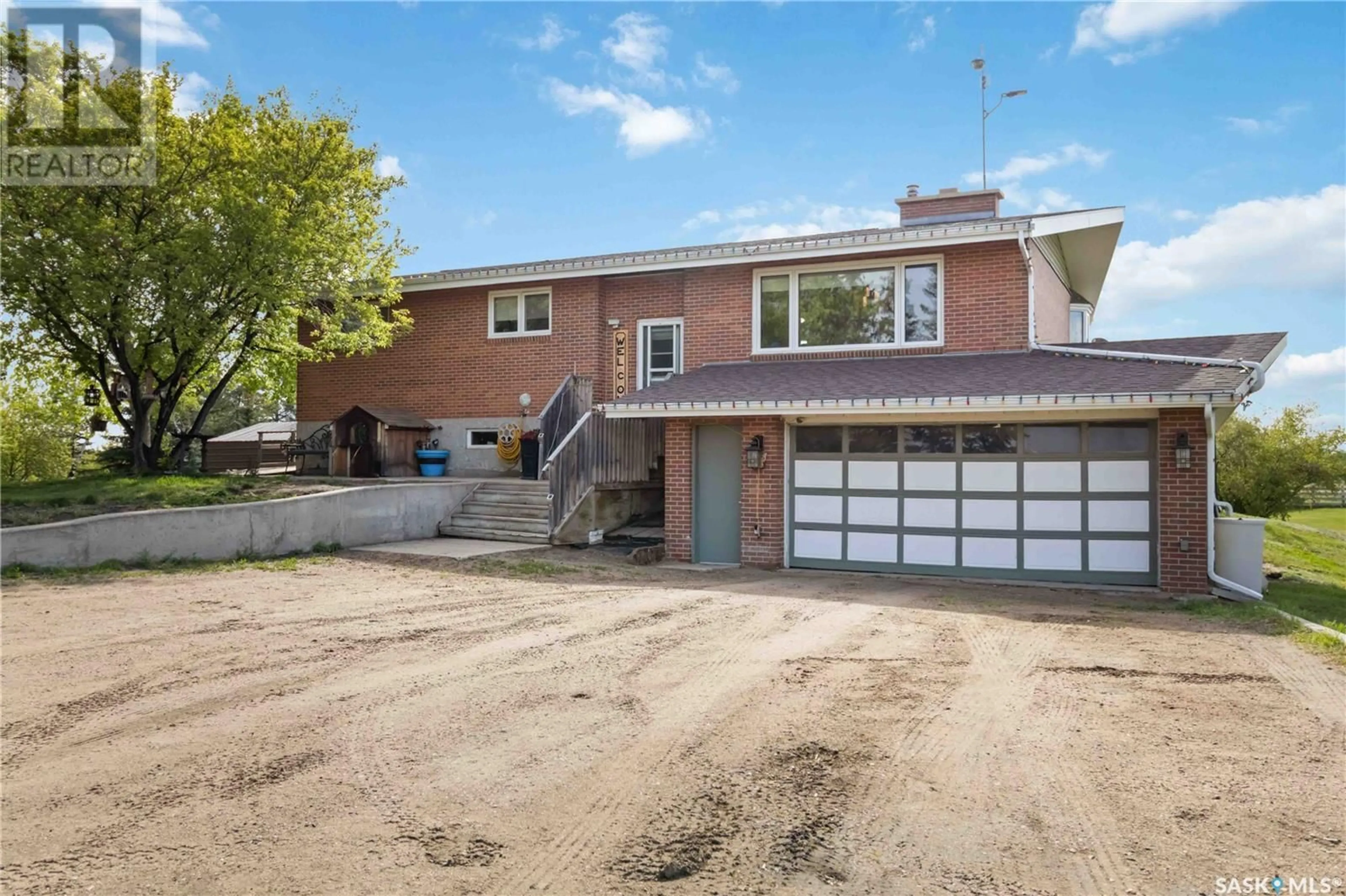 Home with brick exterior material, street for BERGER ACREAGE, Vanscoy Rm No. 345 Saskatchewan S0K1V0