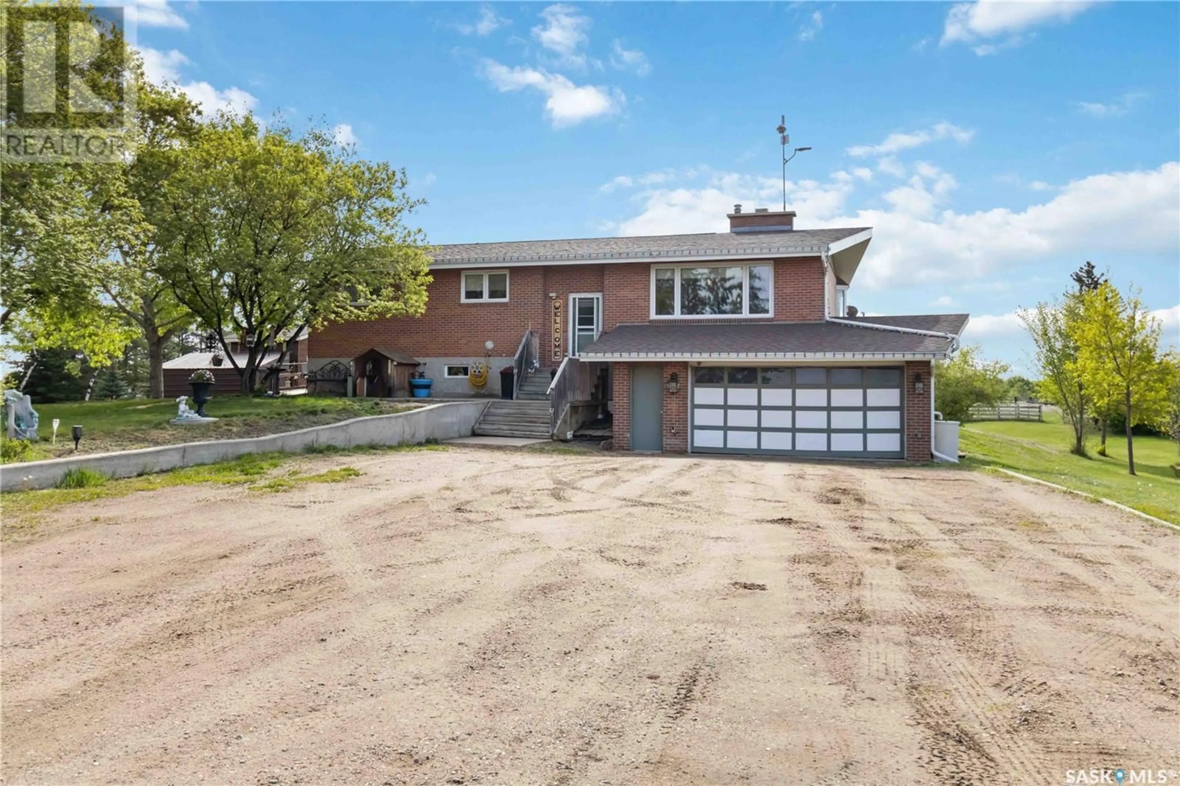Home with brick exterior material, street for BERGER ACREAGE, Vanscoy Rm No. 345 Saskatchewan S0K1V0