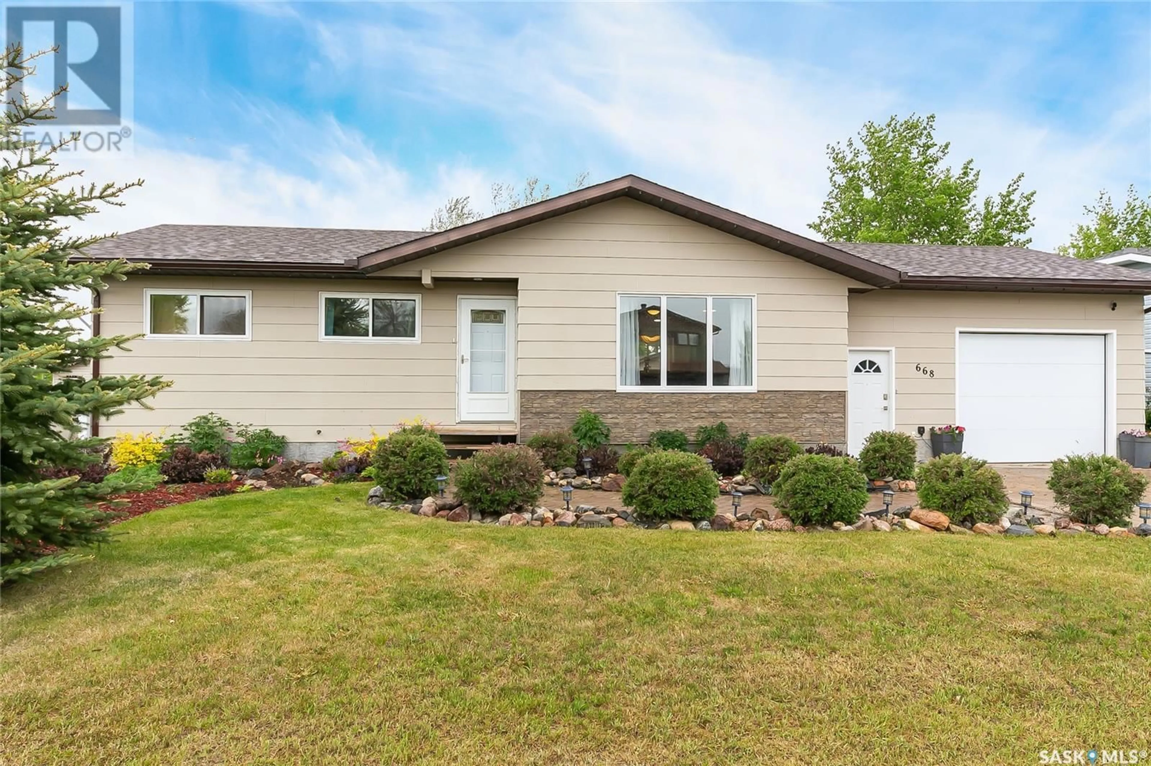 Home with vinyl exterior material, street for 668 GODERICH STREET, Bethune Saskatchewan S0G0H0