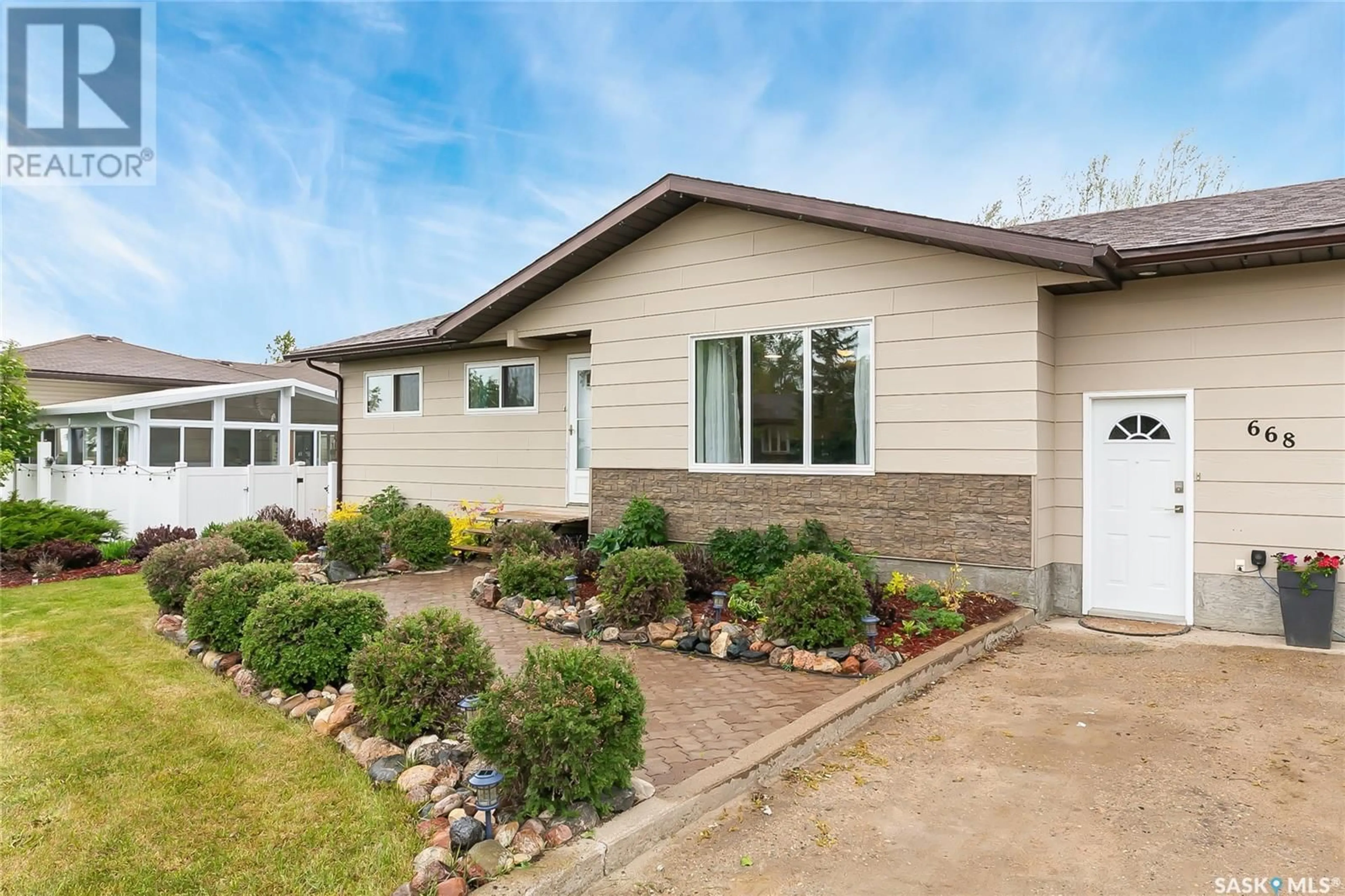 Home with vinyl exterior material, street for 668 GODERICH STREET, Bethune Saskatchewan S0G0H0