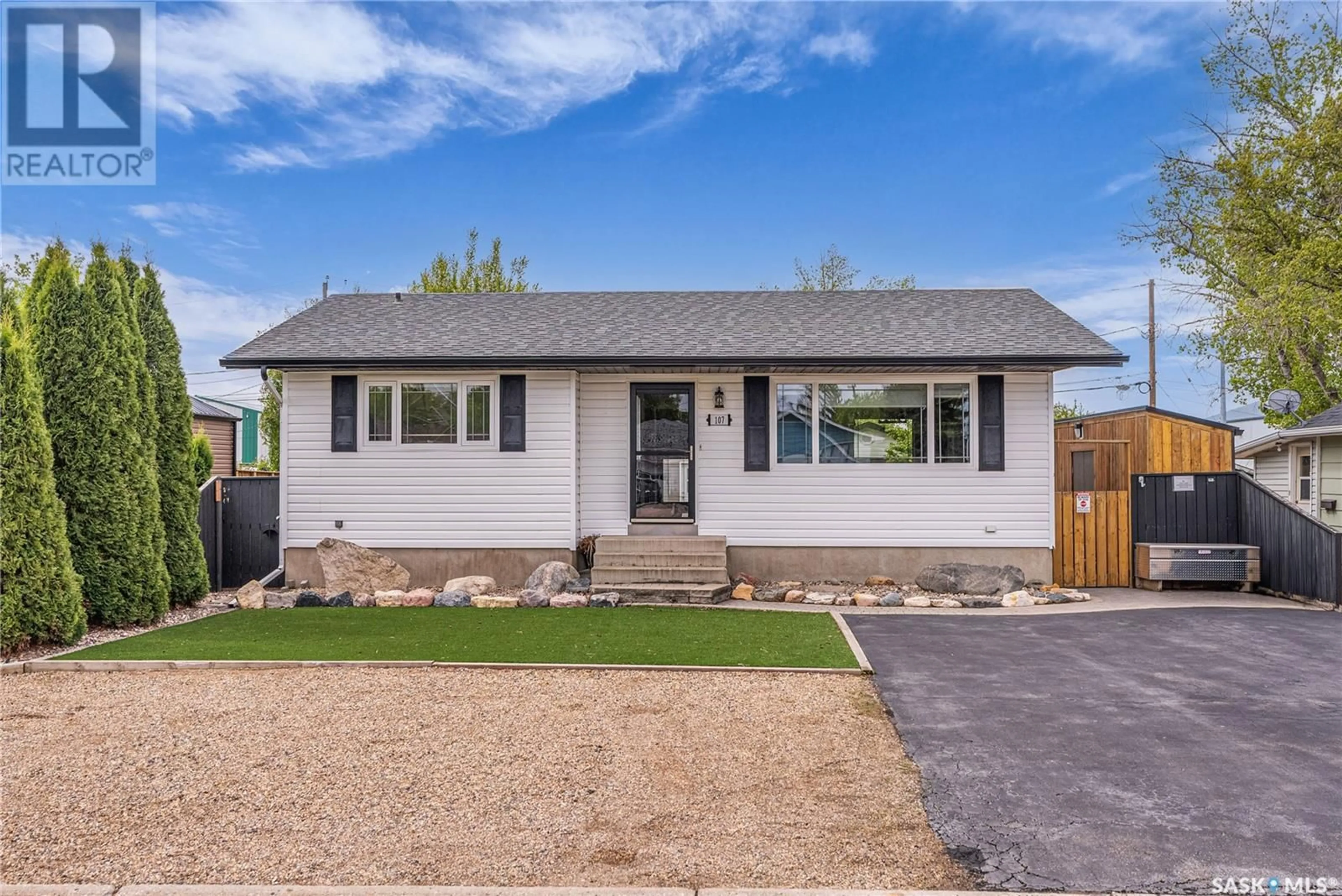 Home with vinyl exterior material, street for 107 4TH AVENUE, Watrous Saskatchewan S0K4T0