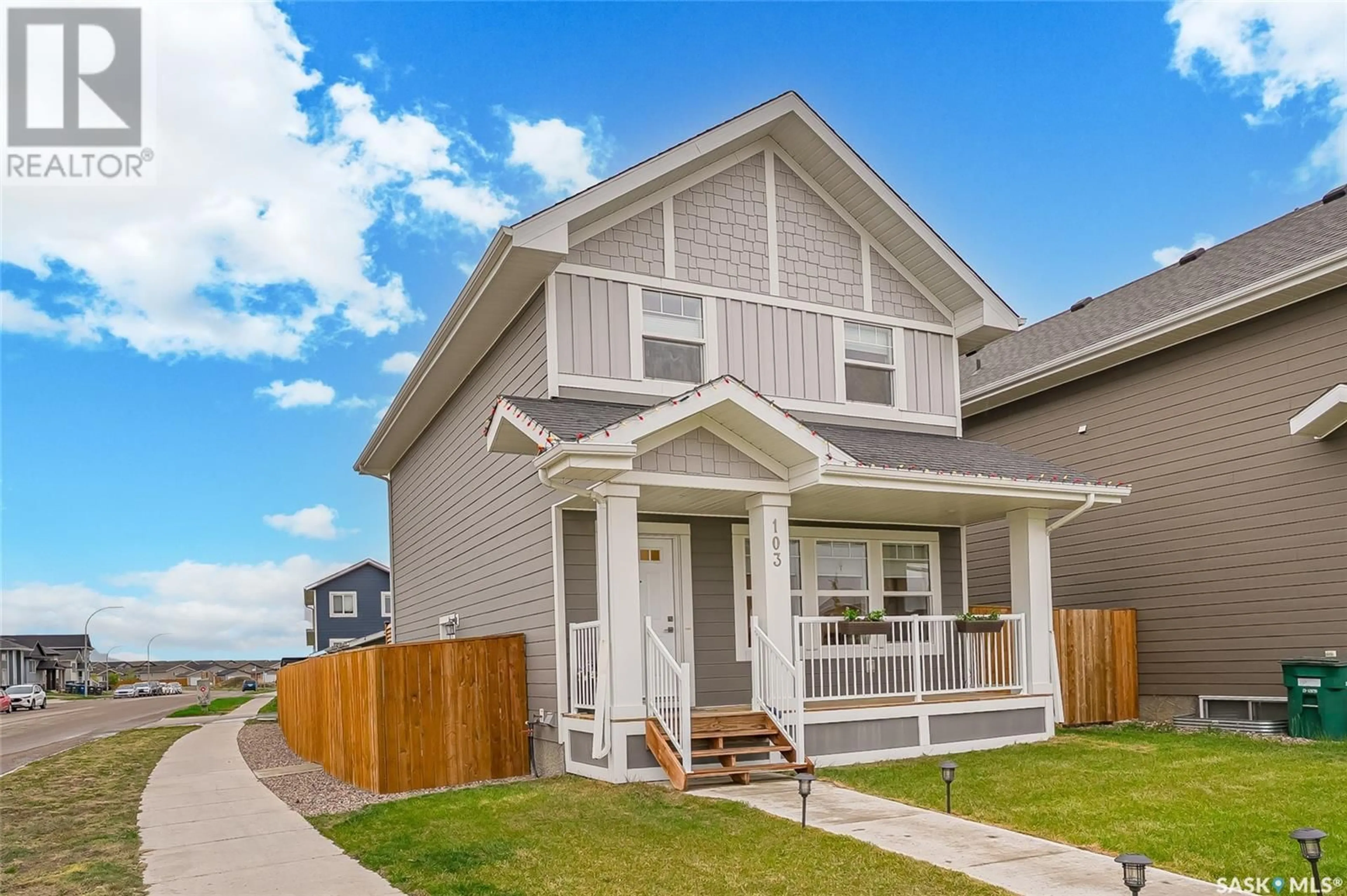 Home with vinyl exterior material, street for 103 STILLING MEWS, Saskatoon Saskatchewan S7V0P4