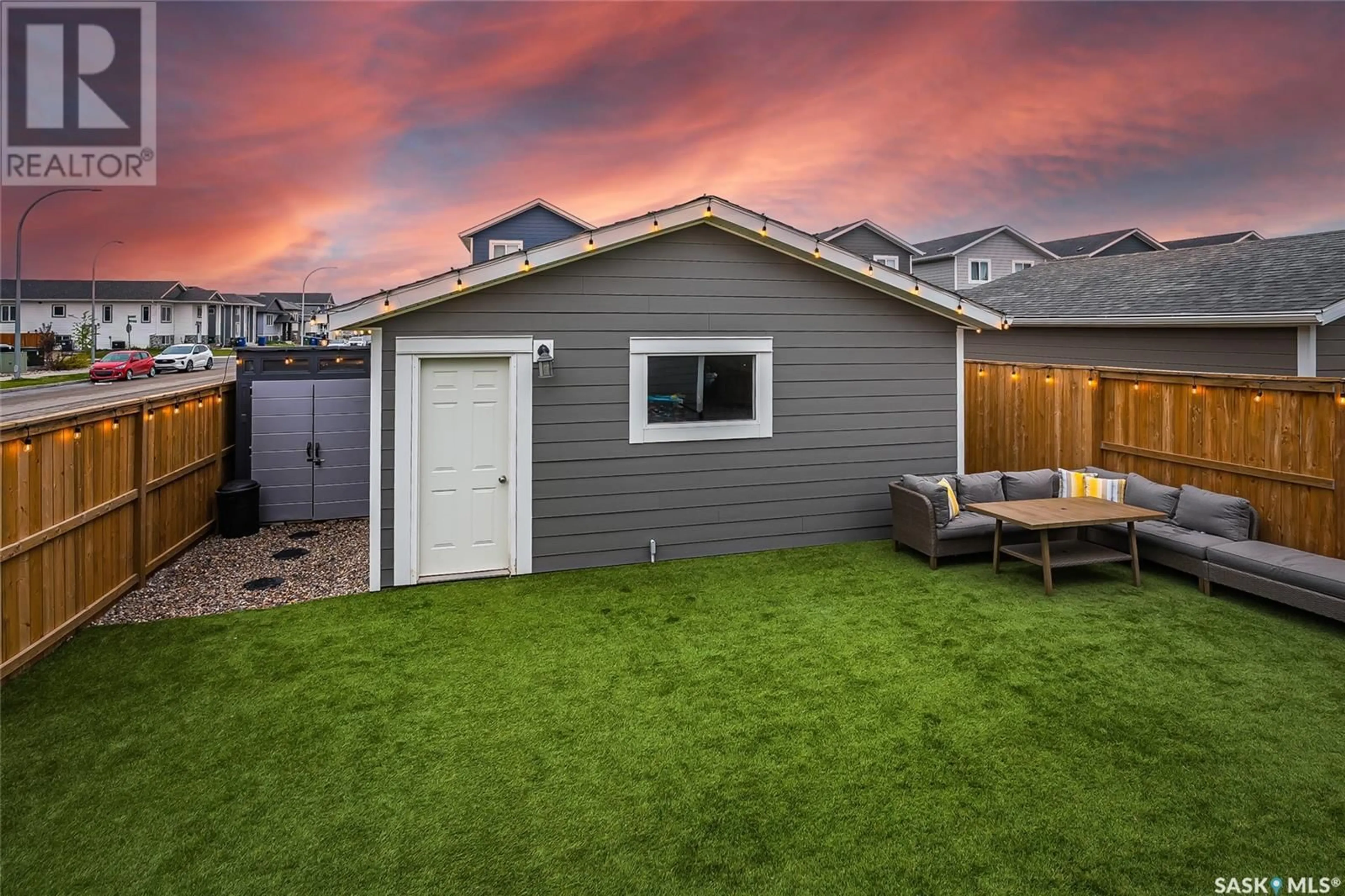 Home with vinyl exterior material, street for 103 STILLING MEWS, Saskatoon Saskatchewan S7V0P4