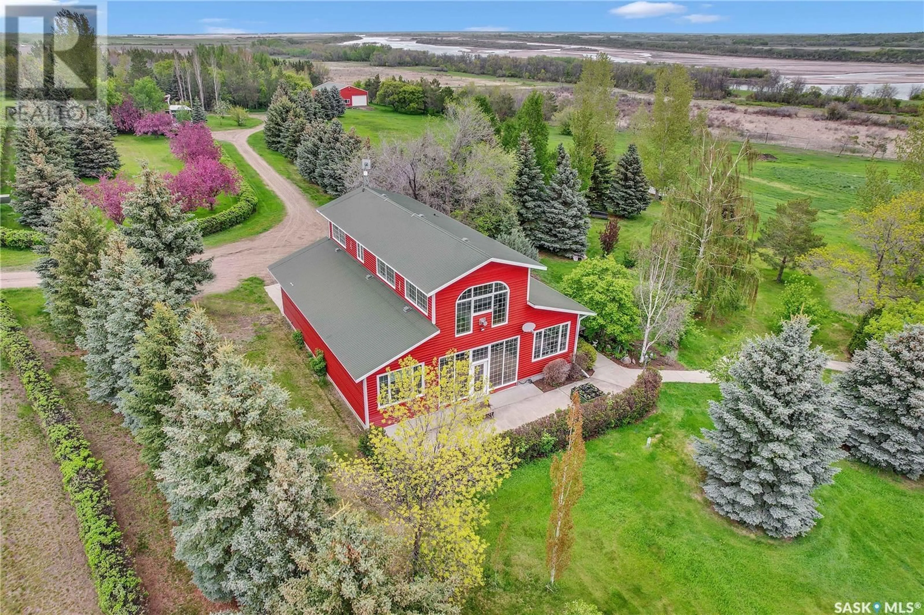 A pic from outside/outdoor area/front of a property/back of a property/a pic from drone, water/lake/river/ocean view for RIVER VIEW, Pike Lake Saskatchewan S0L0P0