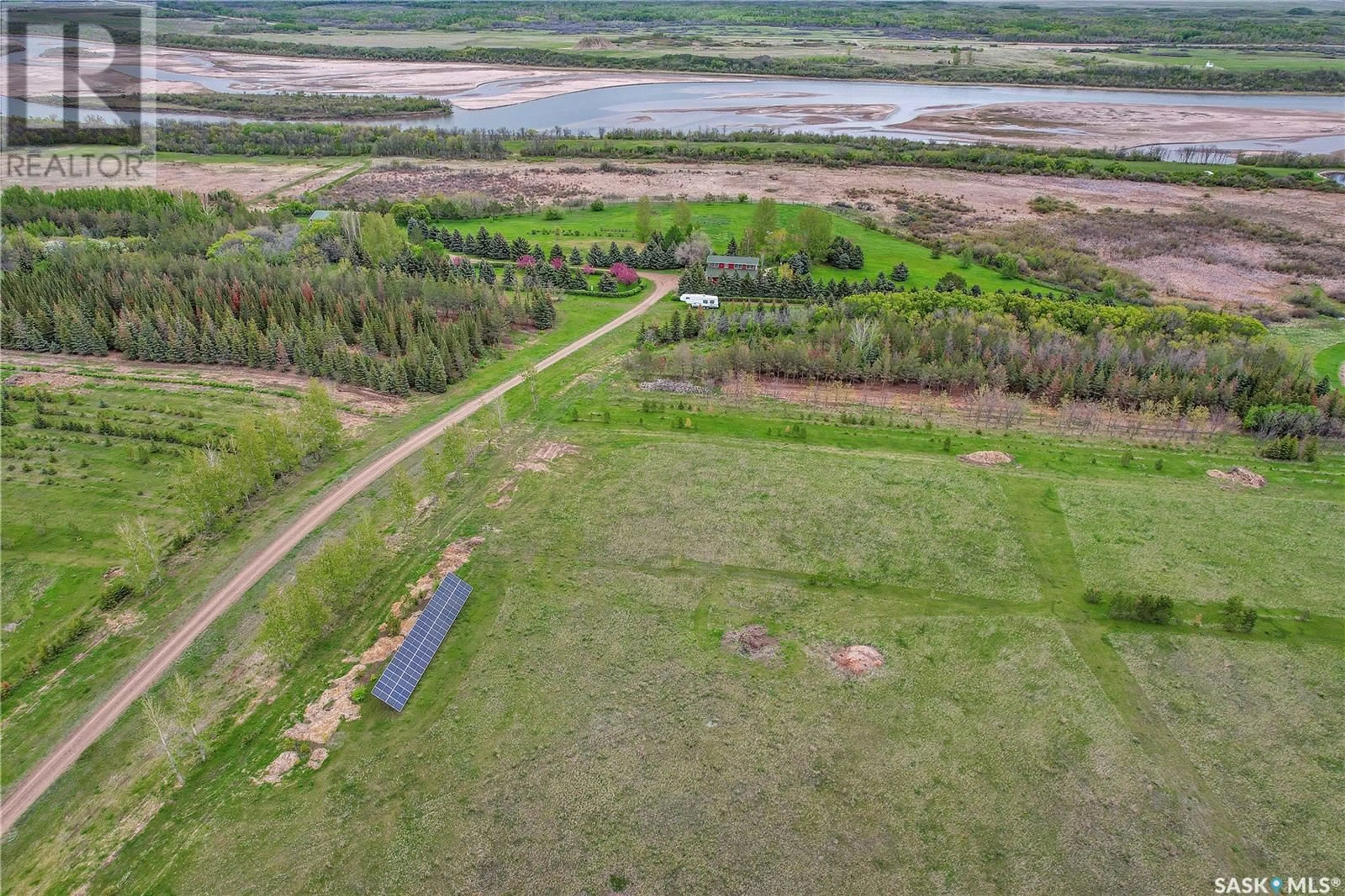 A pic from outside/outdoor area/front of a property/back of a property/a pic from drone, water/lake/river/ocean view for RIVER VIEW, Pike Lake Saskatchewan S0L0P0
