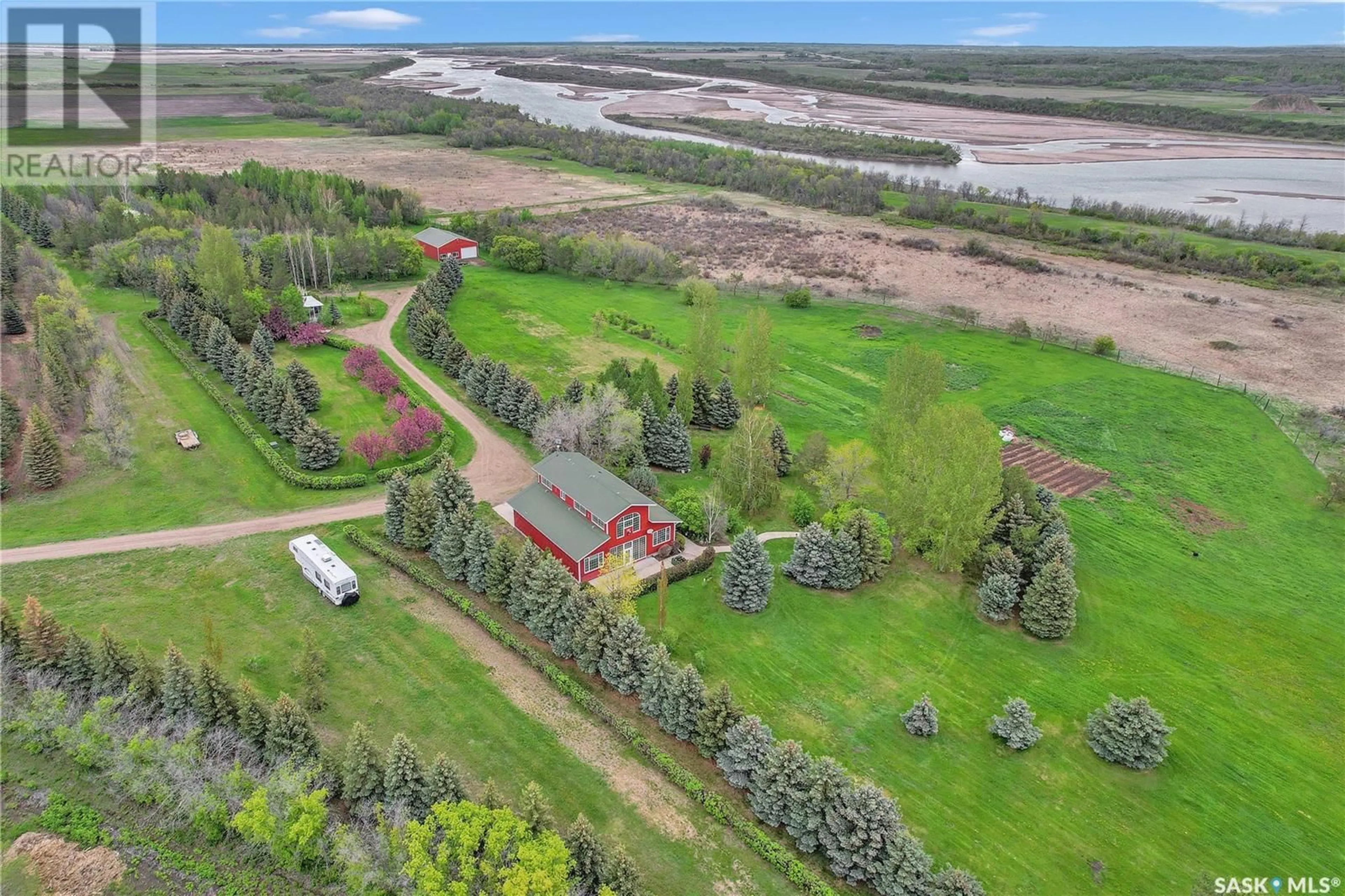 A pic from outside/outdoor area/front of a property/back of a property/a pic from drone, water/lake/river/ocean view for RIVER VIEW, Pike Lake Saskatchewan S0L0P0