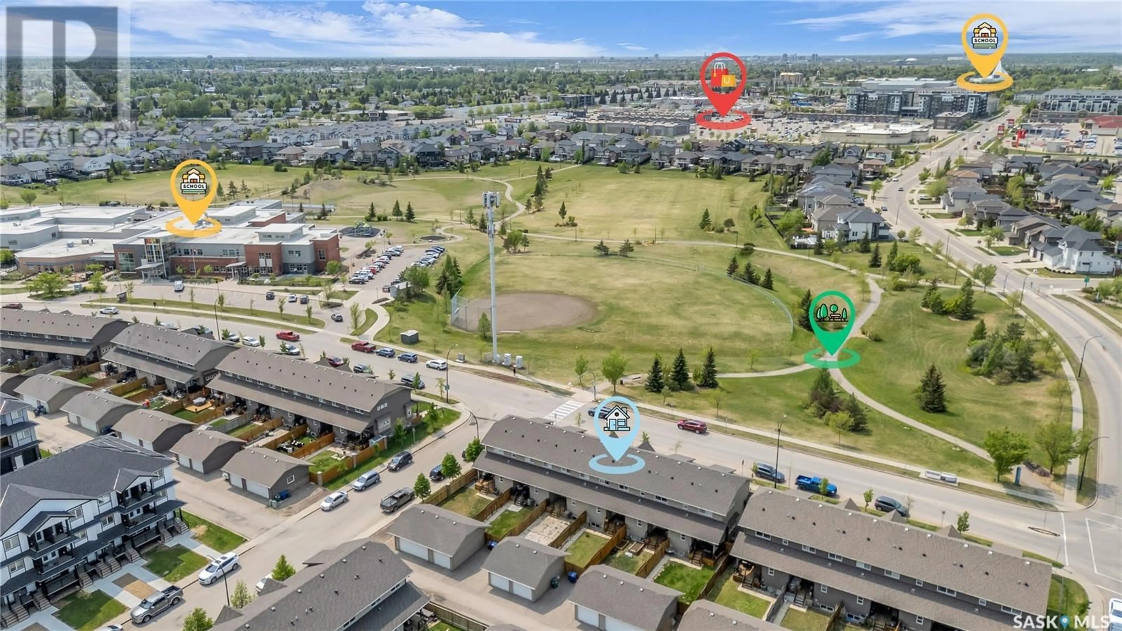 A pic from outside/outdoor area/front of a property/back of a property/a pic from drone, unknown for 908 STENSRUD ROAD, Saskatoon Saskatchewan S7W0L7