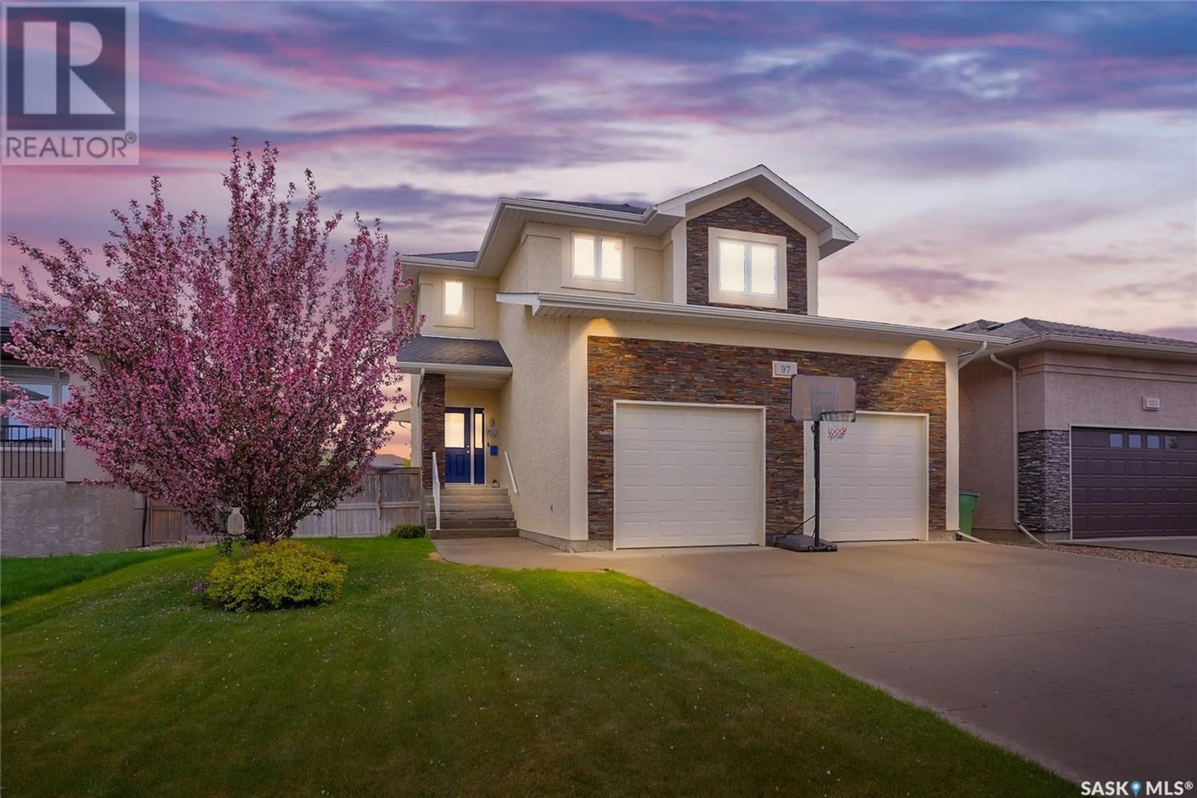 Home with vinyl exterior material, street for 97 GOLDENGLOW DRIVE, Moose Jaw Saskatchewan S6J1N6