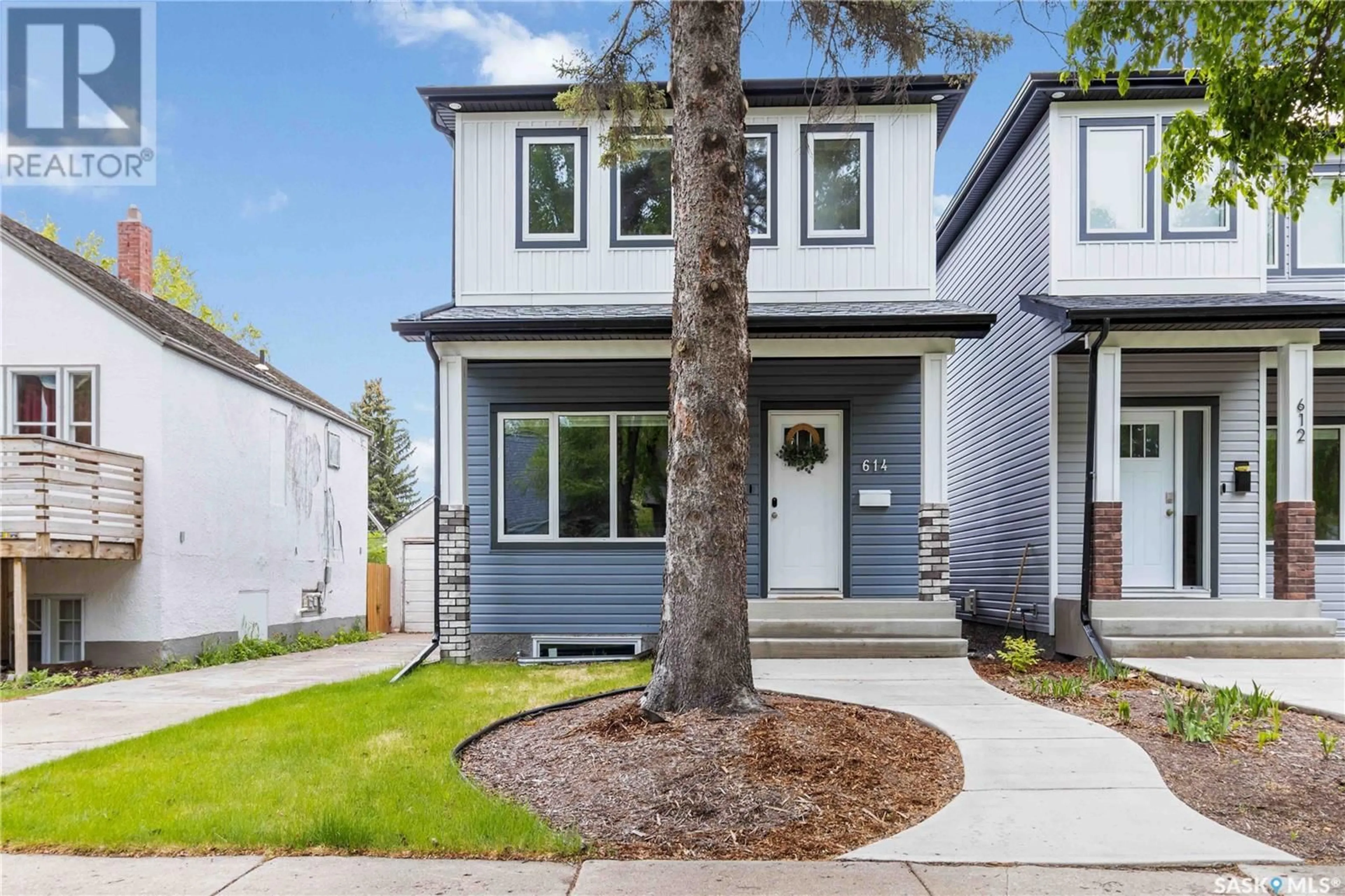 Home with vinyl exterior material, street for 614 5TH STREET, Saskatoon Saskatchewan S7H1G5