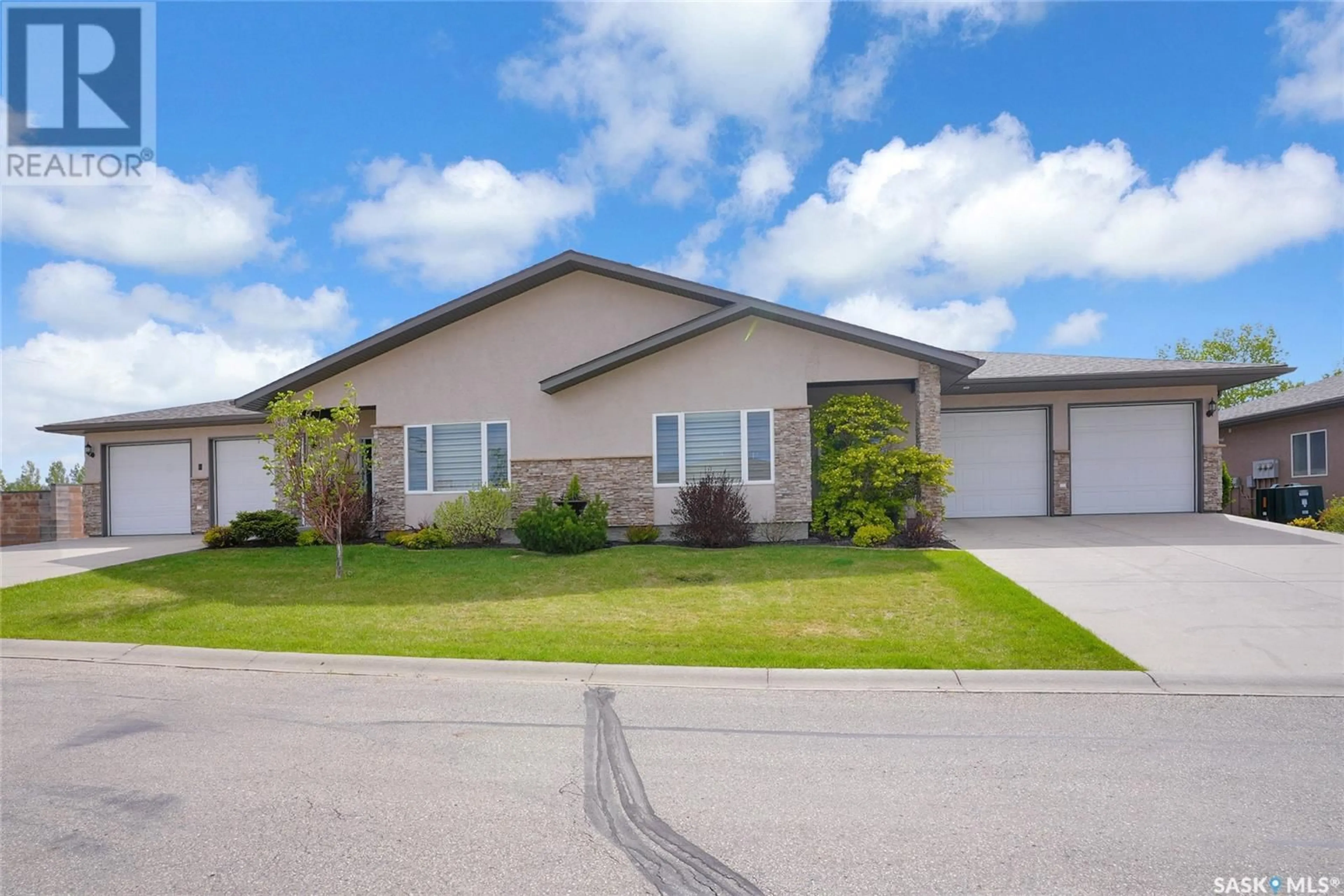 Home with vinyl exterior material, street for 1 - 1590 4TH AVENUE, Moose Jaw Saskatchewan S6J0A5
