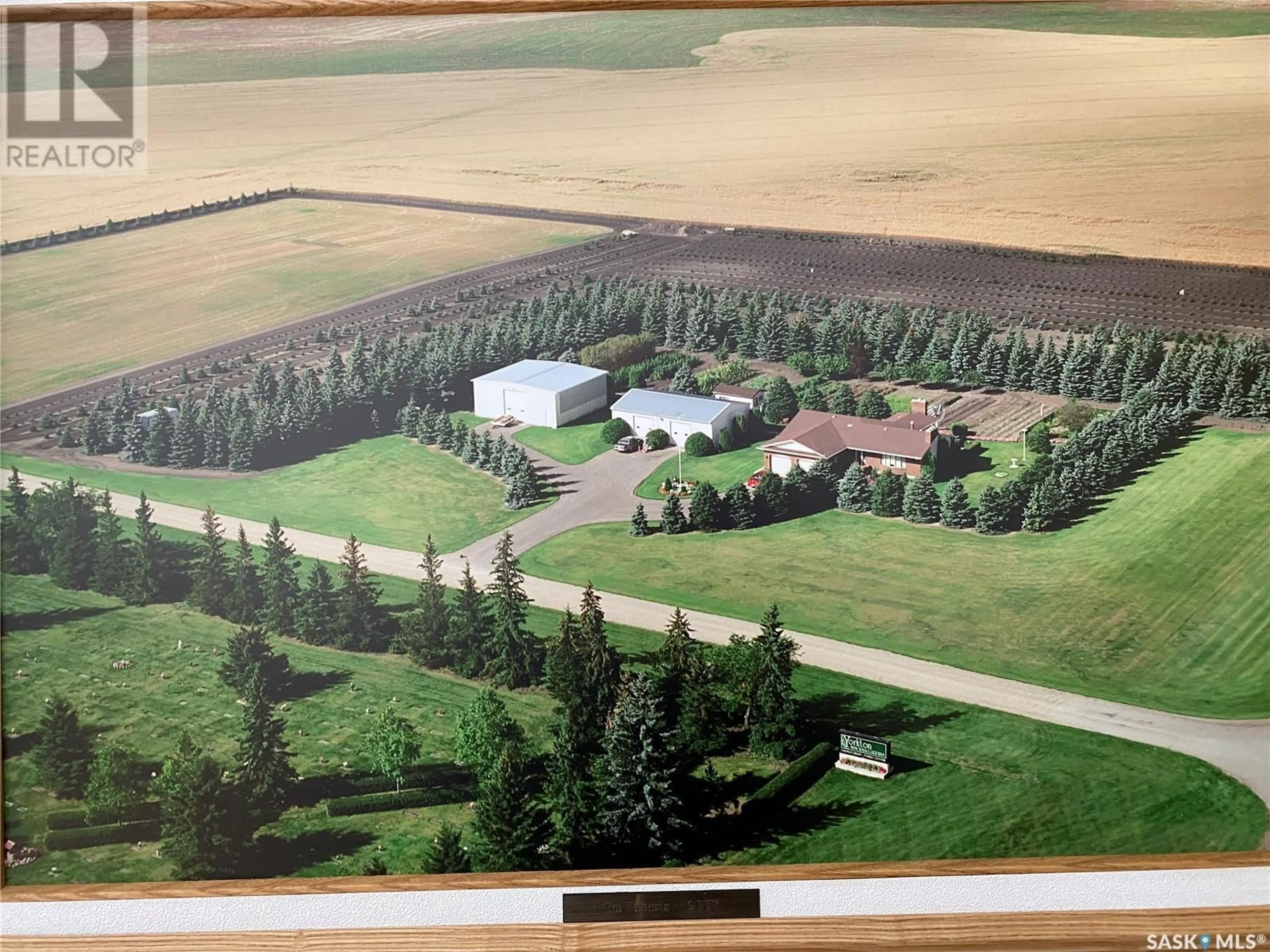 A pic from outside/outdoor area/front of a property/back of a property/a pic from drone, mountain view for REIMER ACREAGE, Yorkton Saskatchewan S3N2V3