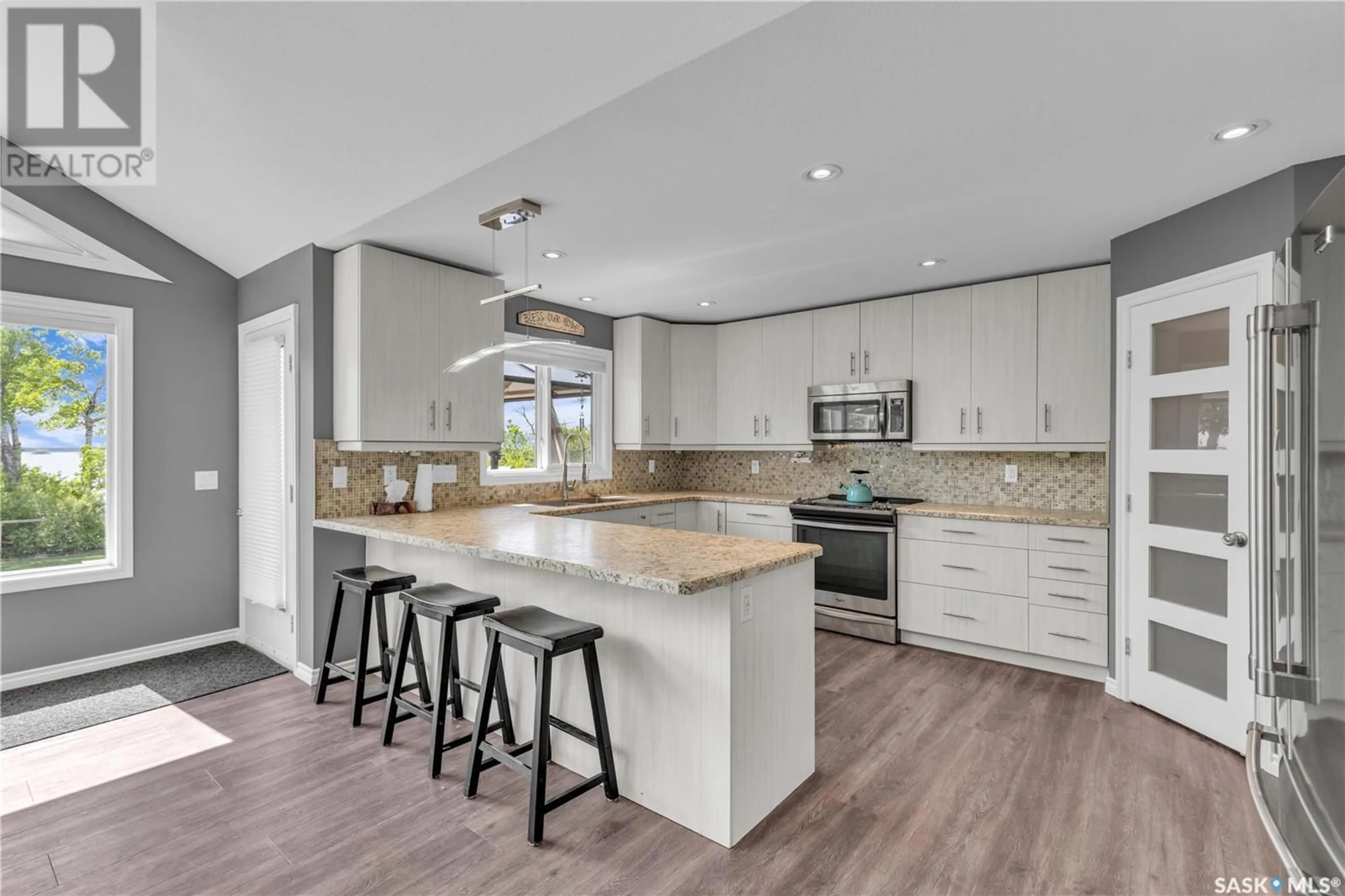 Open concept kitchen, ceramic/tile floor for 22 PAPE DRIVE, Humboldt Lake Saskatchewan S0K2A0