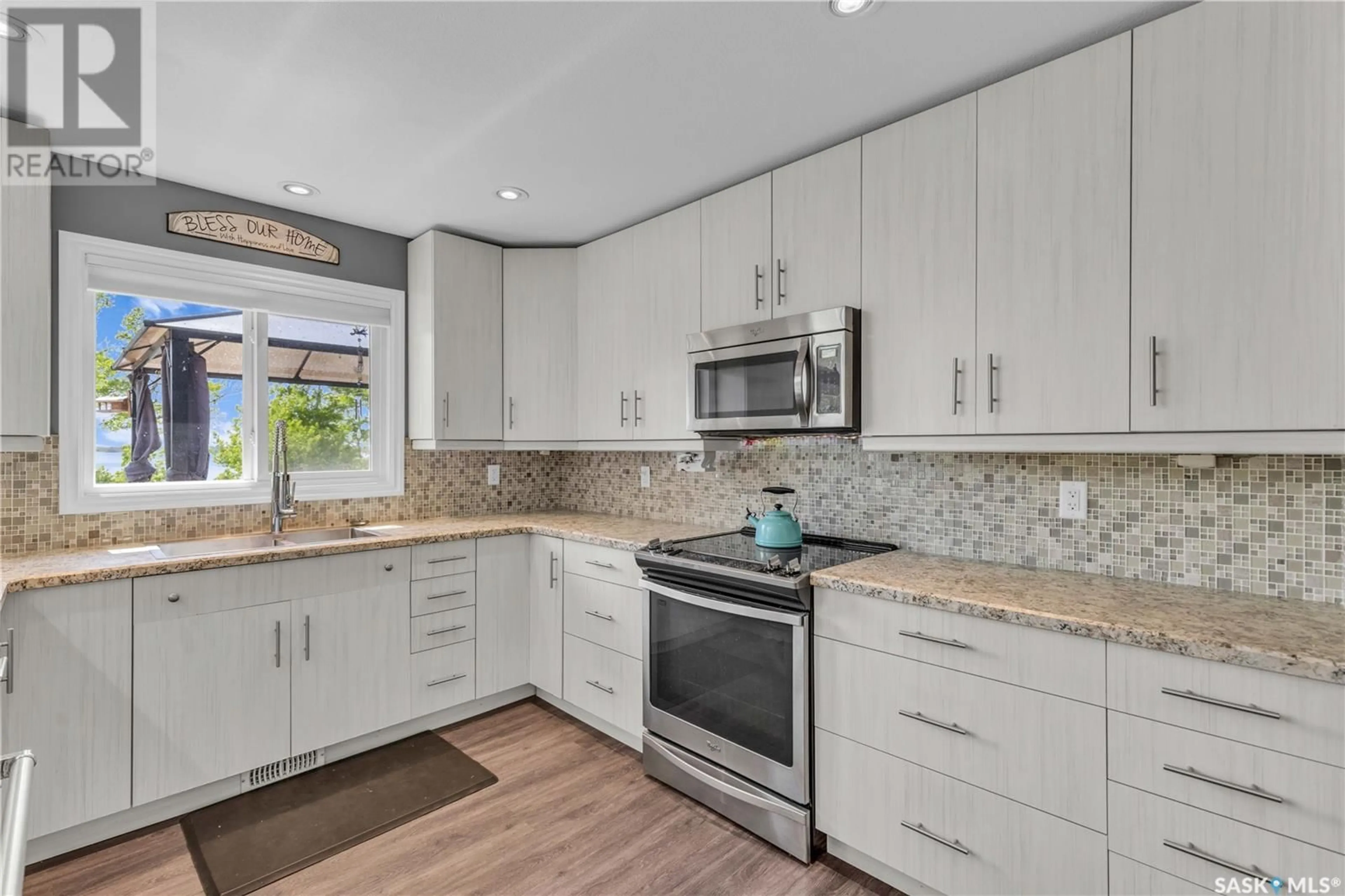 Open concept kitchen, ceramic/tile floor for 22 PAPE DRIVE, Humboldt Lake Saskatchewan S0K2A0