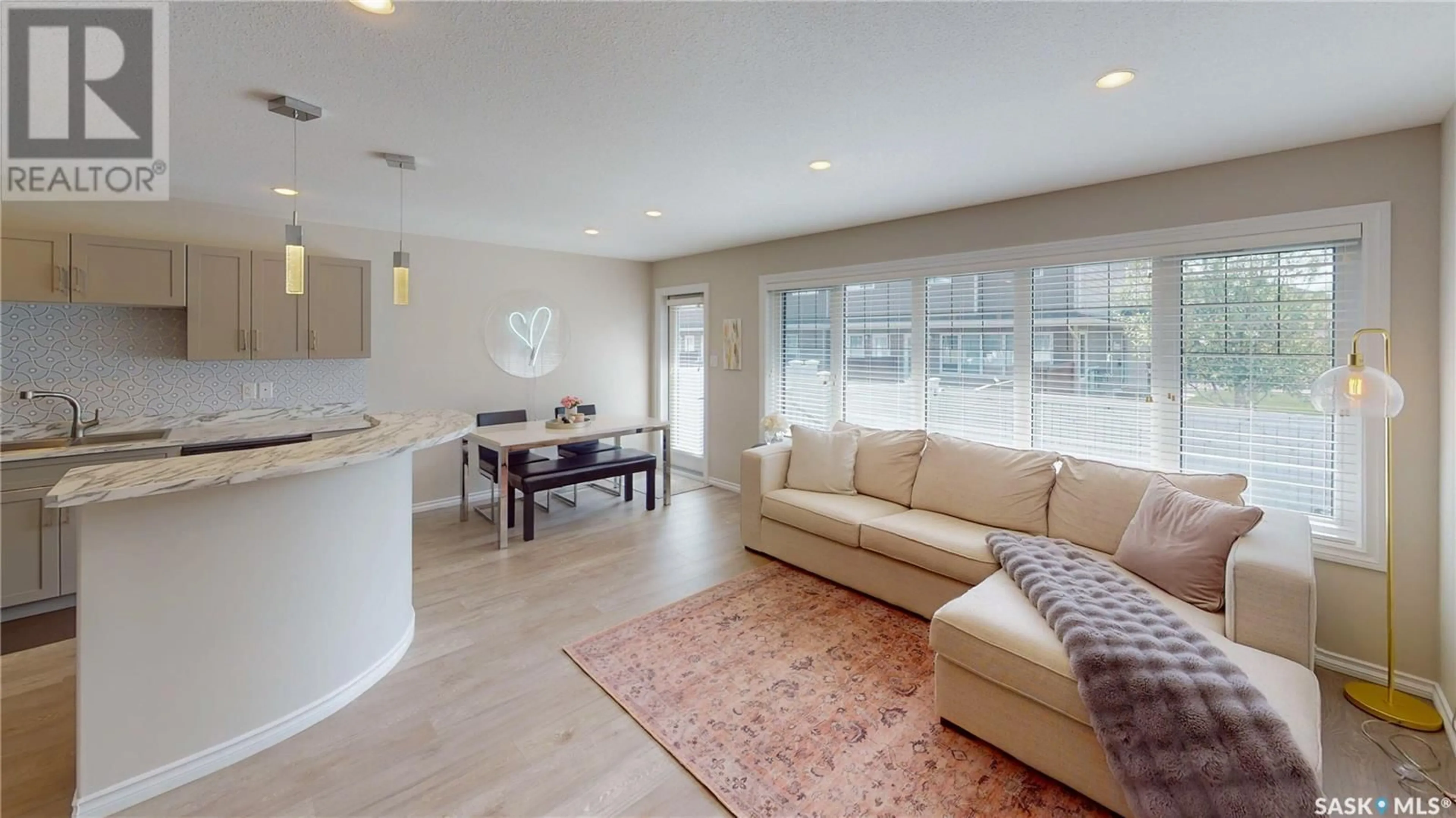Living room with furniture, ceramic/tile floor for 4000 - 347 SANDHILL CRESCENT, Regina Saskatchewan S4V3G7
