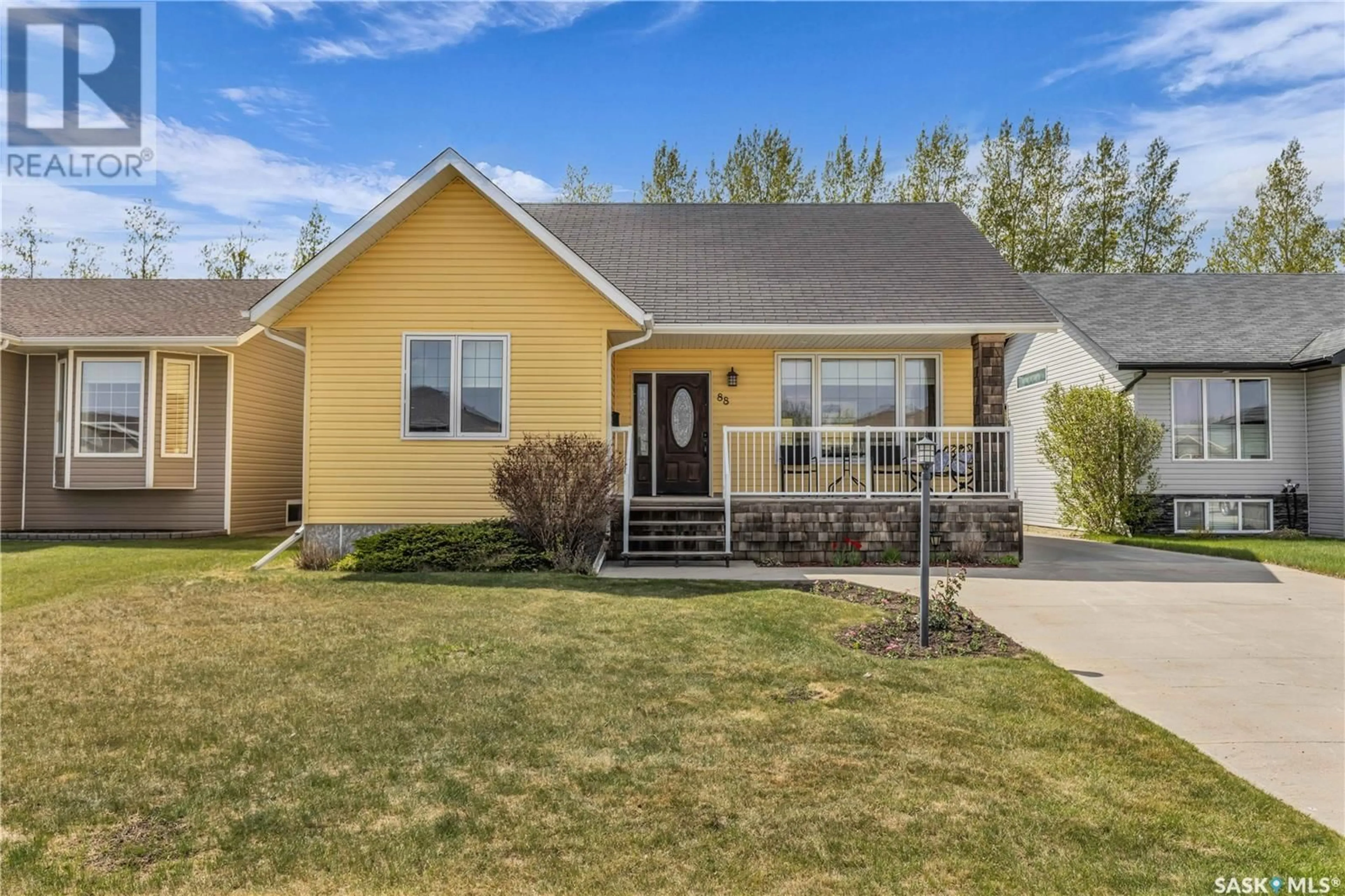Home with vinyl exterior material, street for 88 LASKIN CRESCENT, Humboldt Saskatchewan S0K2A0