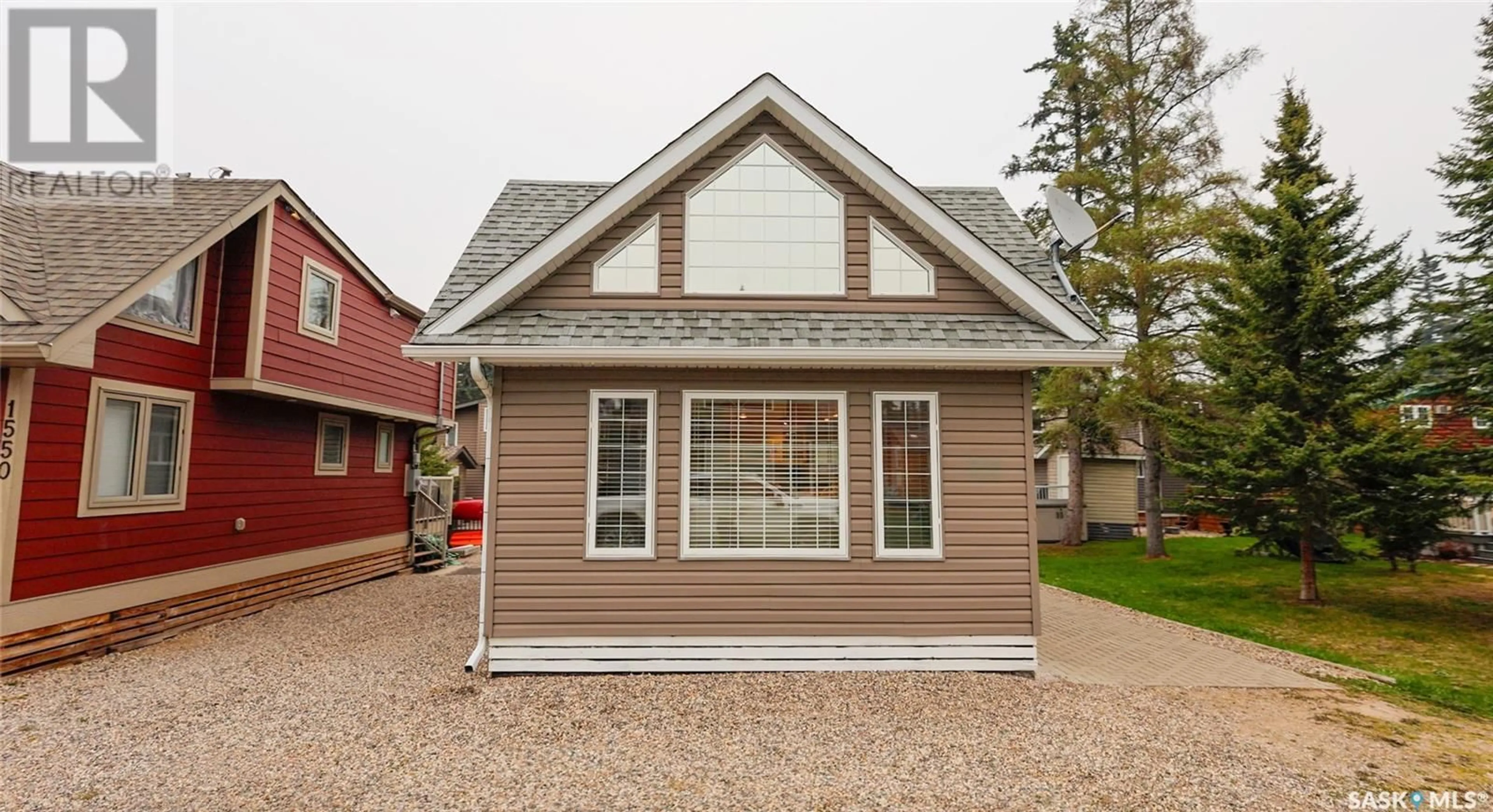 Home with vinyl exterior material, street for 1546 GREBE STREET, Prince Albert National Park Saskatchewan S0J0N0