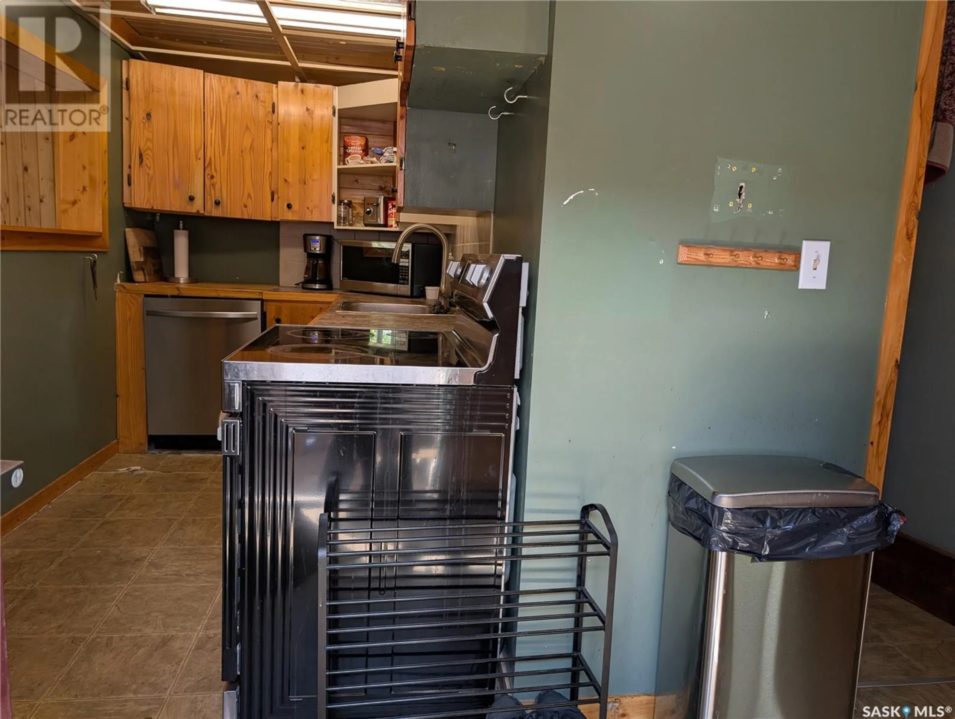 Kitchen with laundary machines, ceramic/tile floor for 2049 EDGAR STREET, Regina Saskatchewan S4N3K5