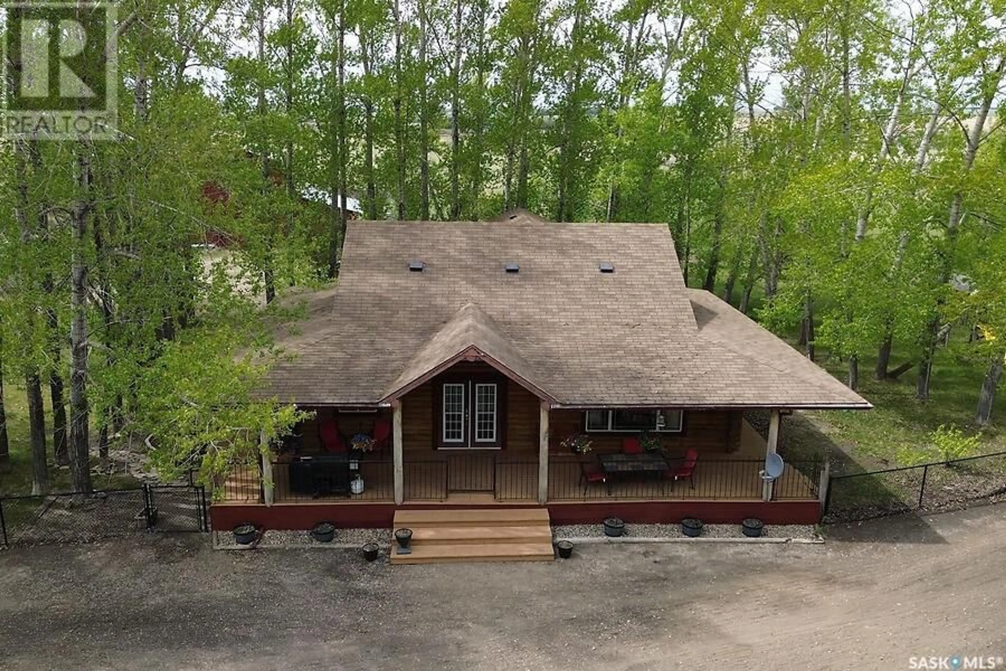 A pic from outside/outdoor area/front of a property/back of a property/a pic from drone, unknown for GOLLER ACREAGE, Fish Creek Rm No. 402 Saskatchewan S0K4P0
