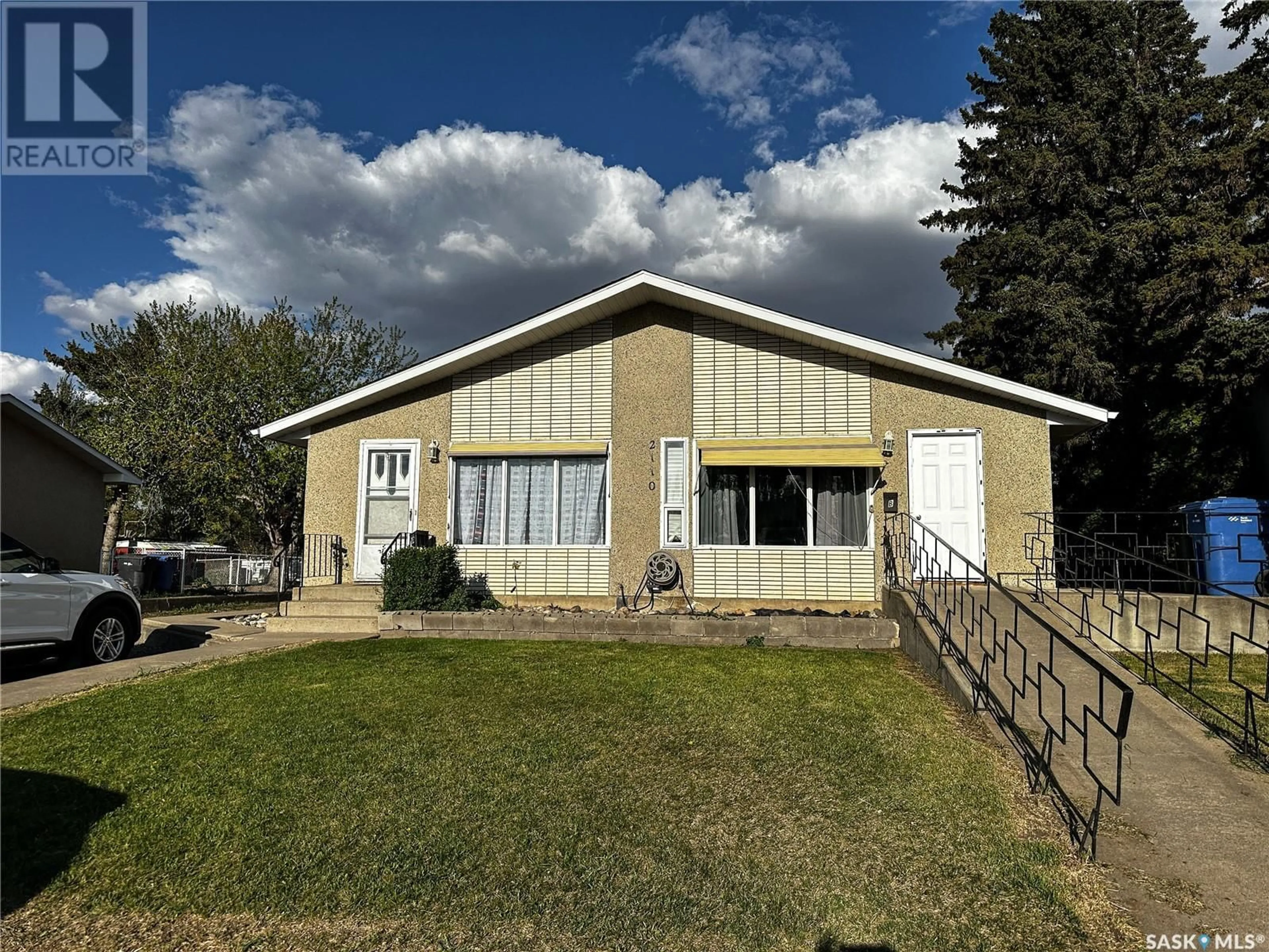 Home with vinyl exterior material, building for 2110 101ST CRESCENT, North Battleford Saskatchewan S9A1C3