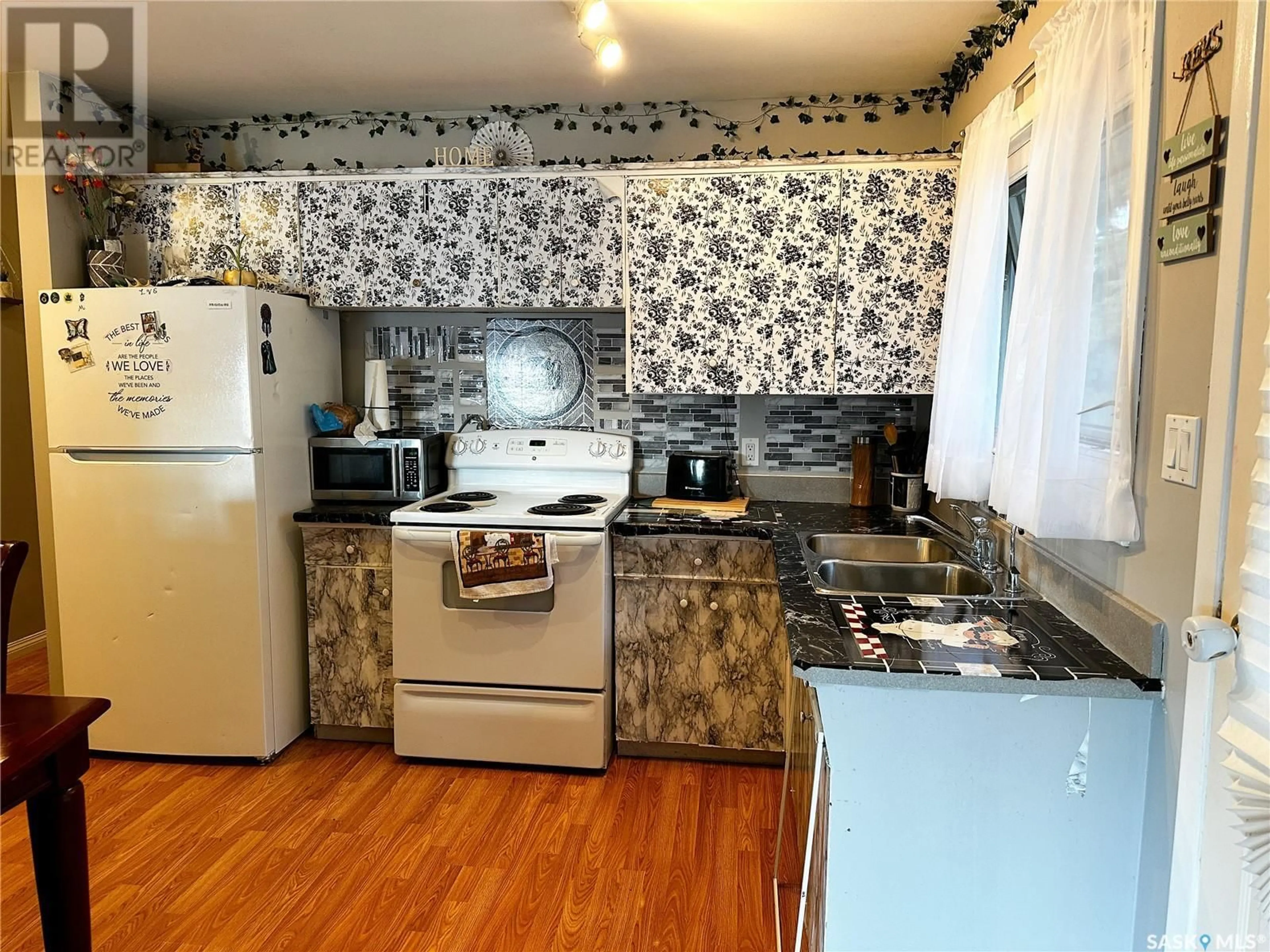 Standard kitchen, wood/laminate floor for 2110 101ST CRESCENT, North Battleford Saskatchewan S9A1C3