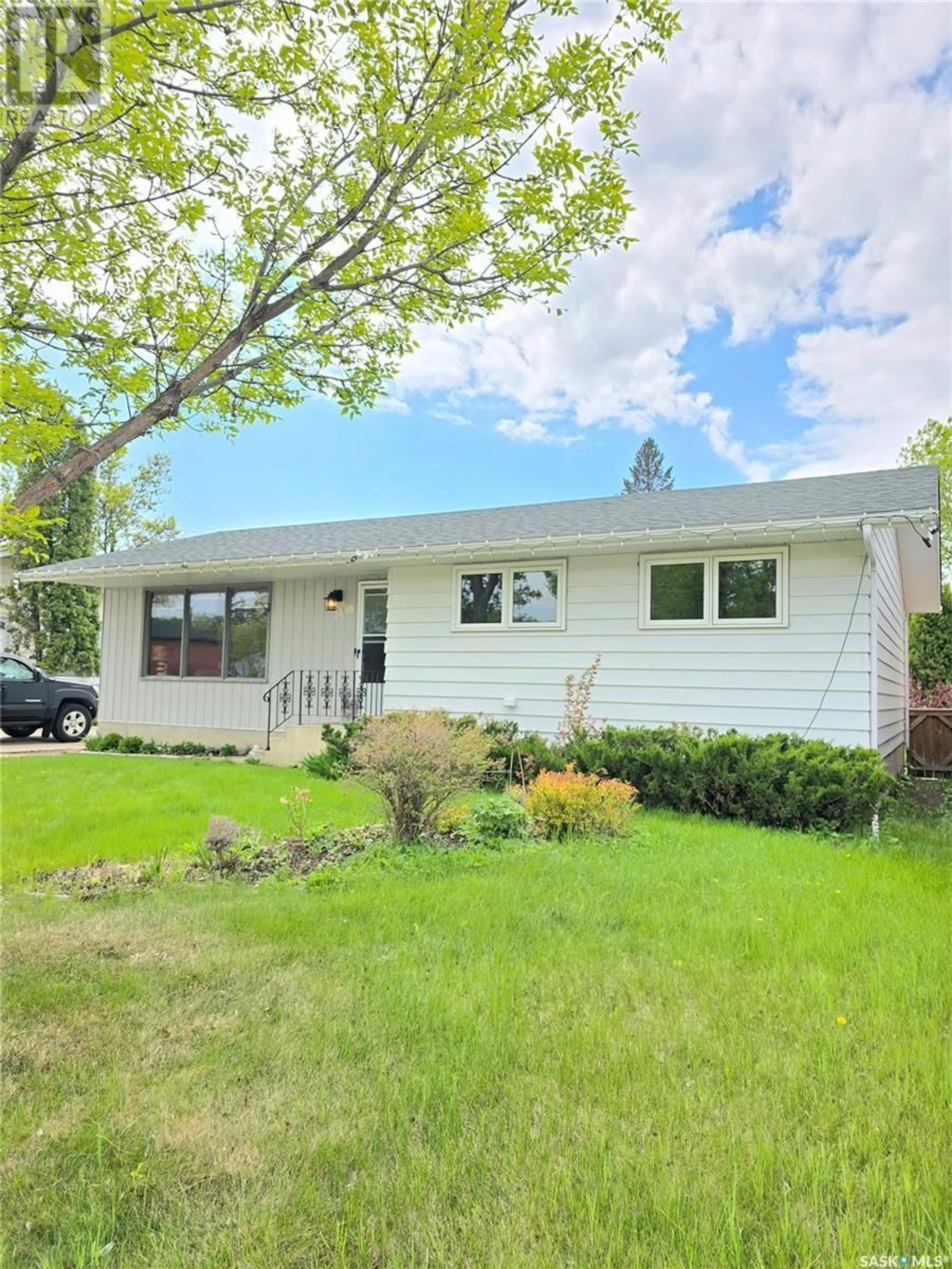 Home with vinyl exterior material, street for 1809 C AVENUE, Saskatoon Saskatchewan S7L1L9