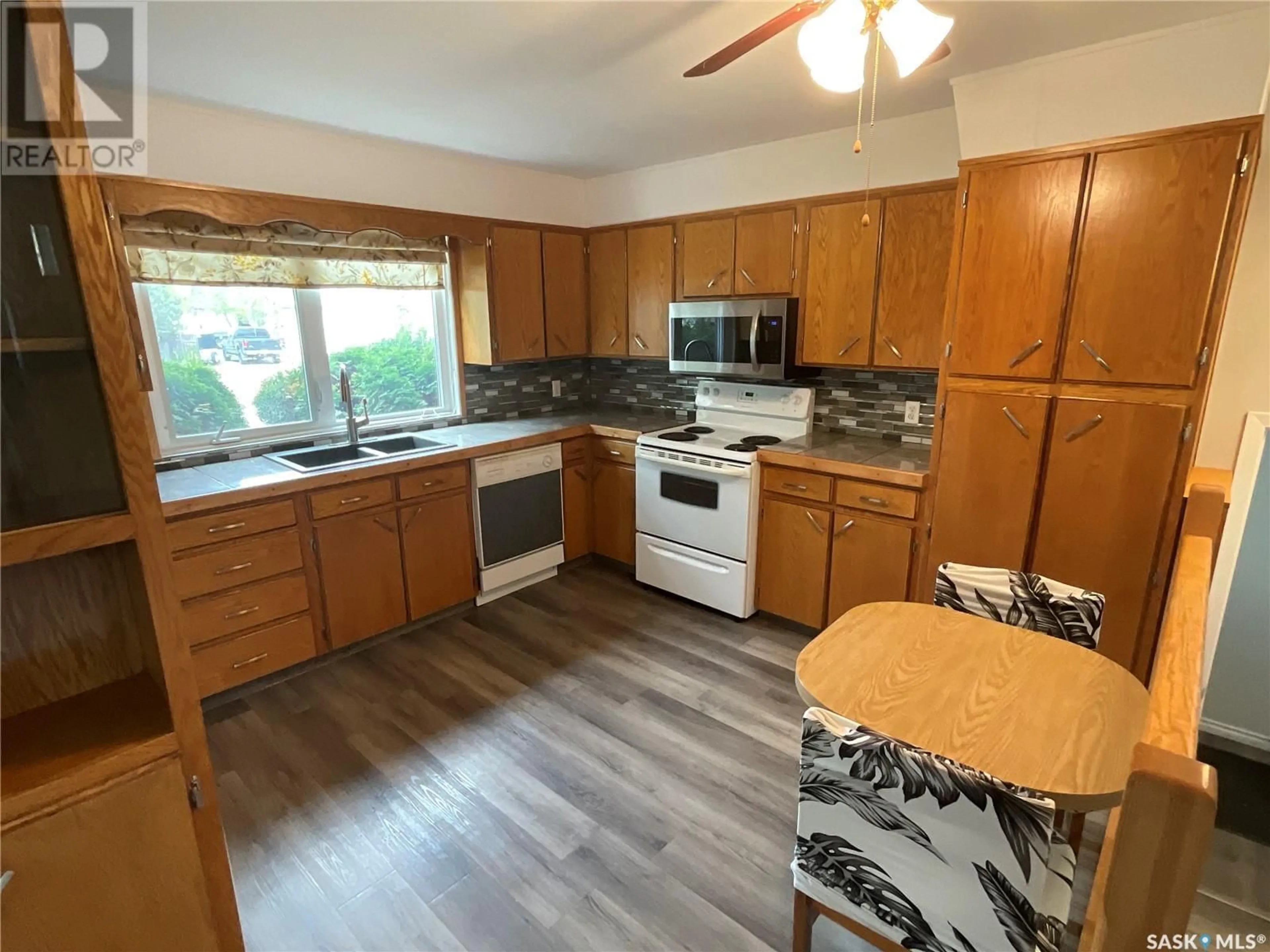 Standard kitchen, wood/laminate floor for N - 107 1ST STREET, Wakaw Saskatchewan S0K4P0