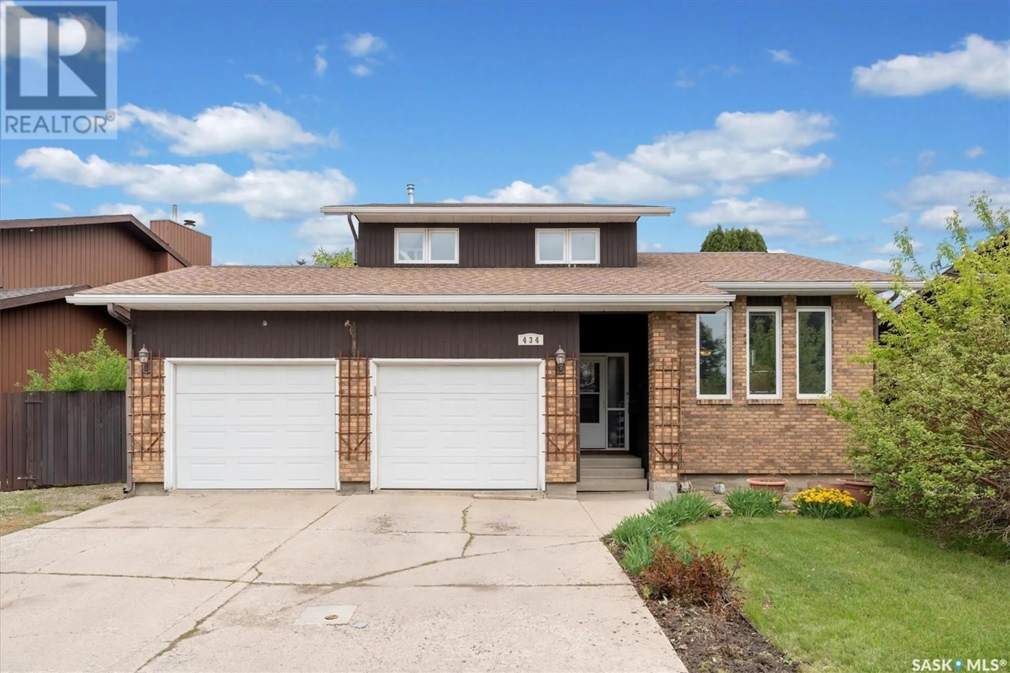 Home with brick exterior material, street for 434 DELARONDE ROAD, Saskatoon Saskatchewan S7J3Y7