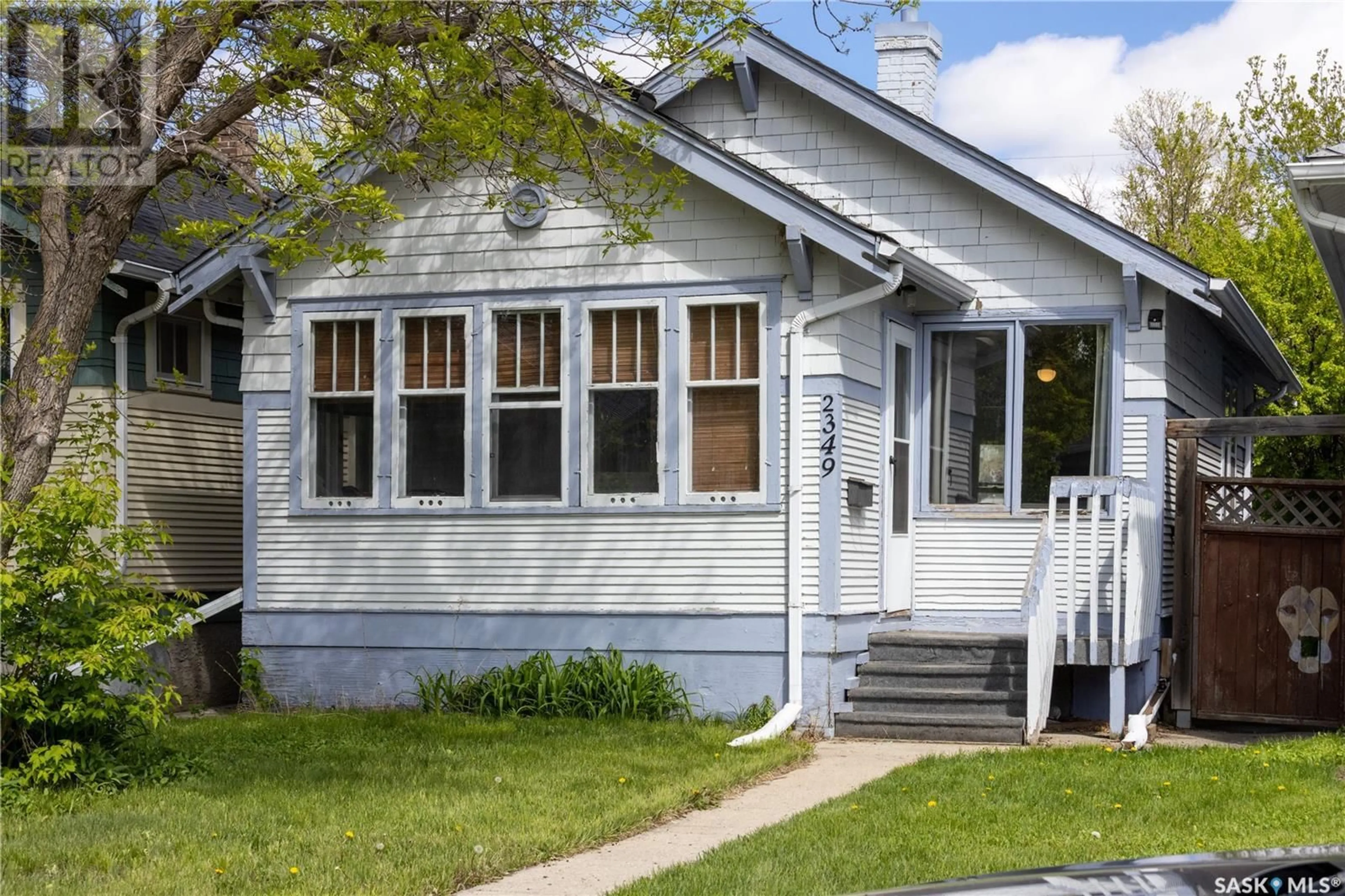 Home with vinyl exterior material, street for 2349 BRODER STREET, Regina Saskatchewan S4N3S9