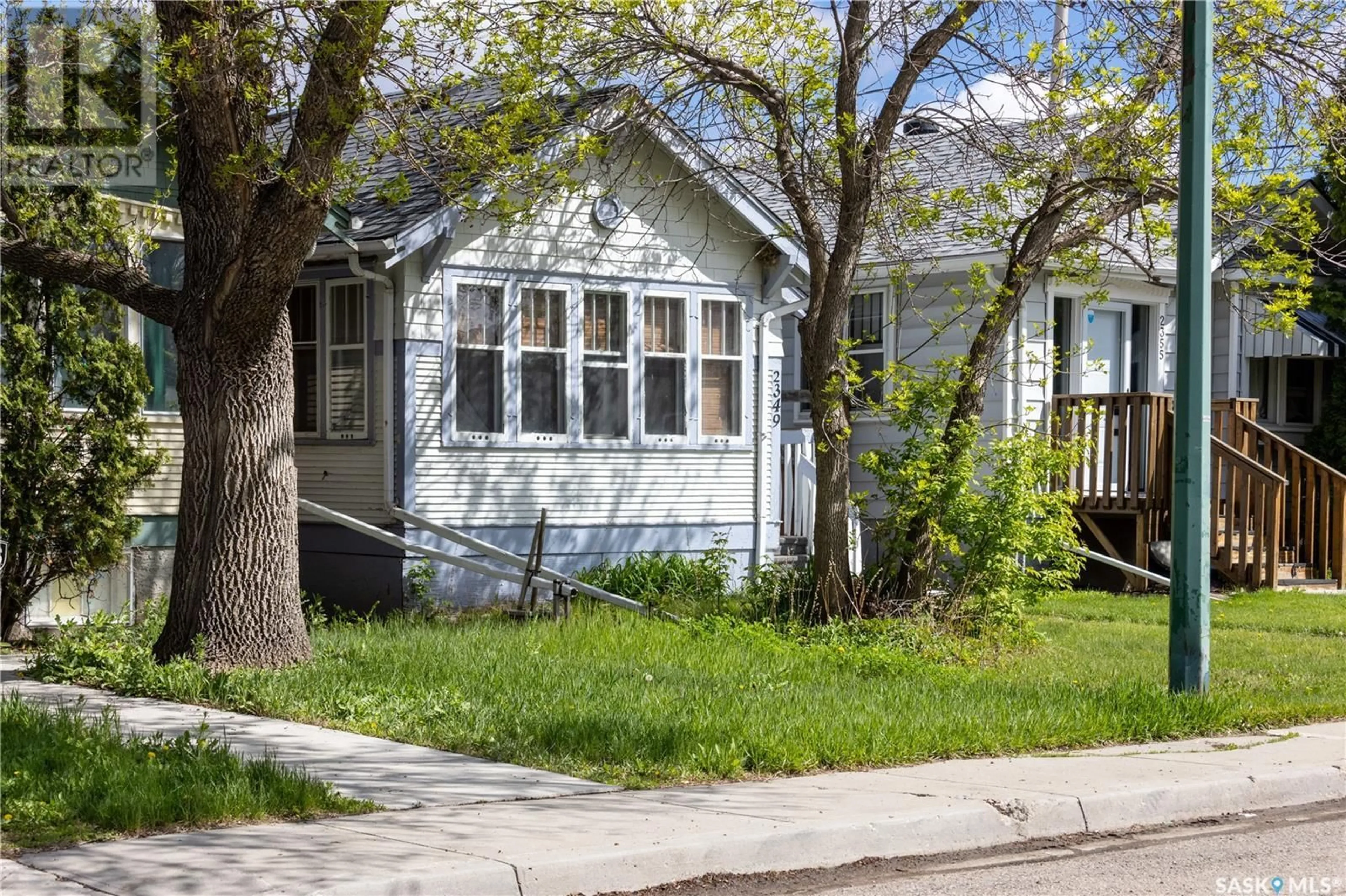 Home with vinyl exterior material, street for 2349 BRODER STREET, Regina Saskatchewan S4N3S9