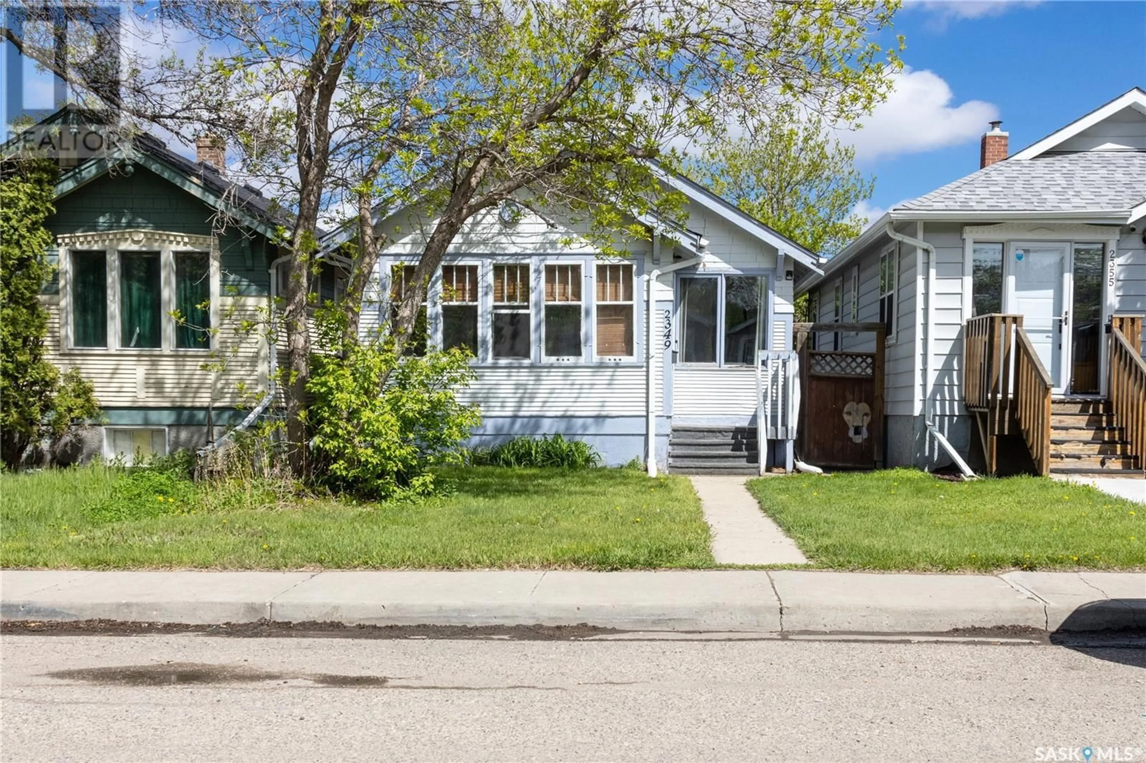Home with vinyl exterior material, street for 2349 BRODER STREET, Regina Saskatchewan S4N3S9