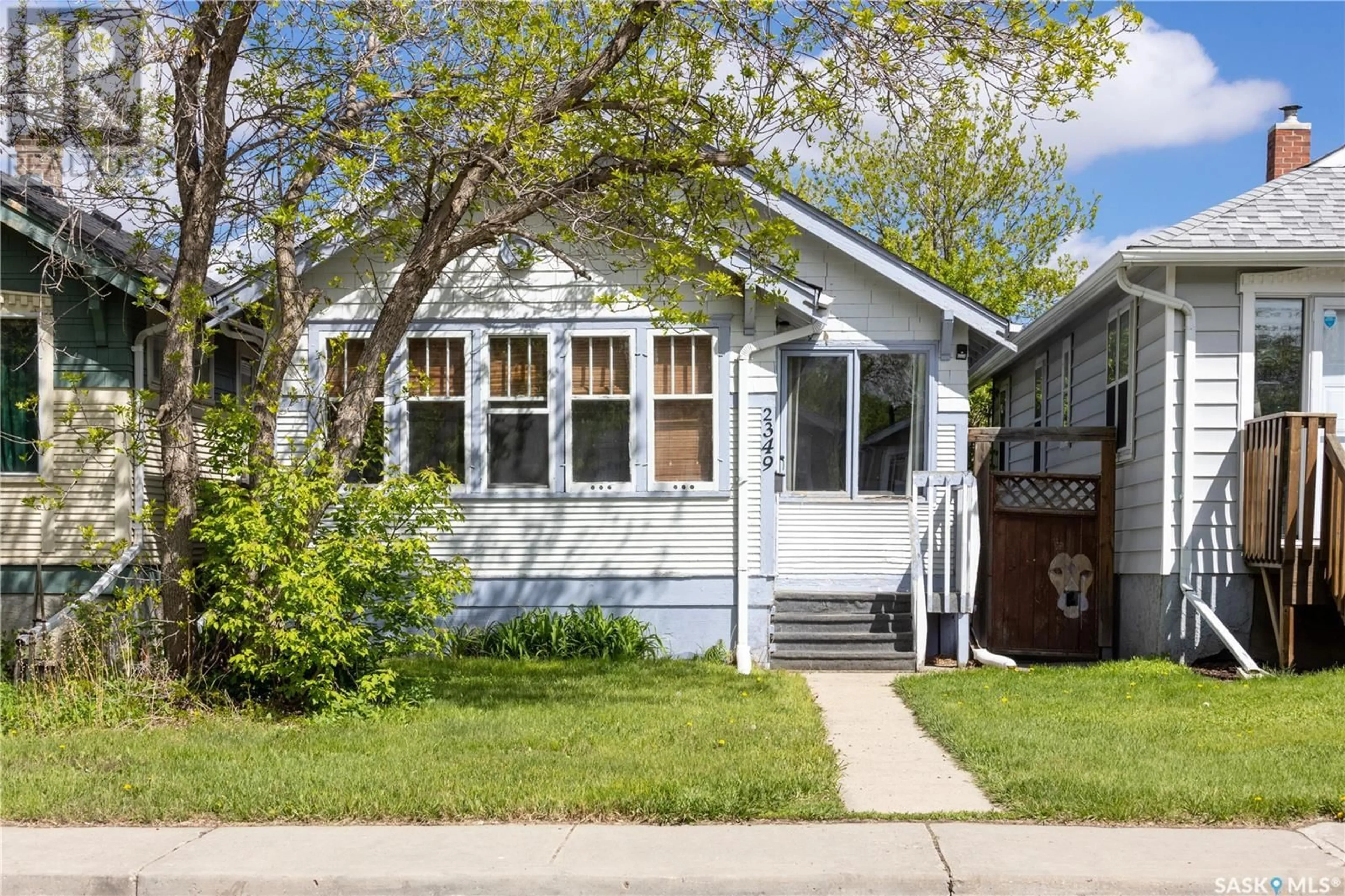 Home with vinyl exterior material, street for 2349 BRODER STREET, Regina Saskatchewan S4N3S9