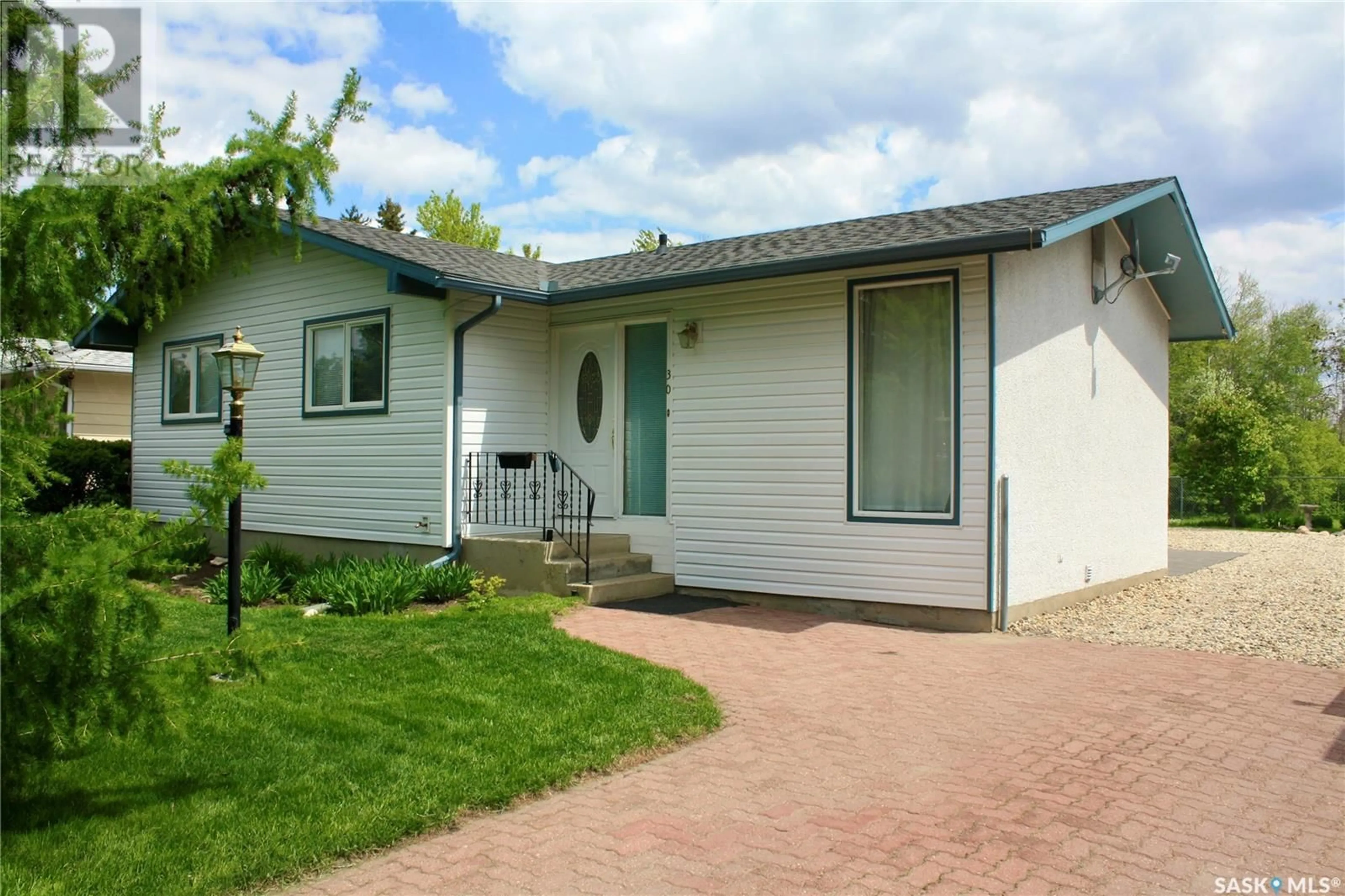 Home with vinyl exterior material, street for 30 ALBANY CRESCENT, Saskatoon Saskatchewan S7K1J3