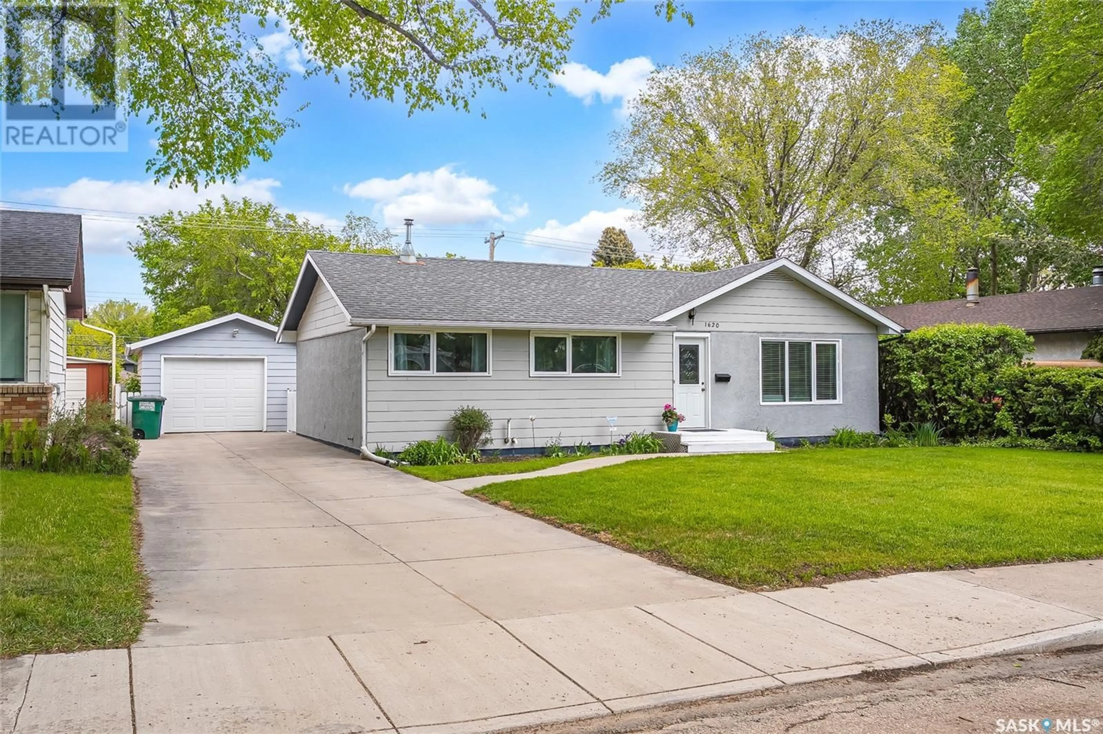 Home with vinyl exterior material, street for 1620 9TH AVENUE, Saskatoon Saskatchewan S7K3A1