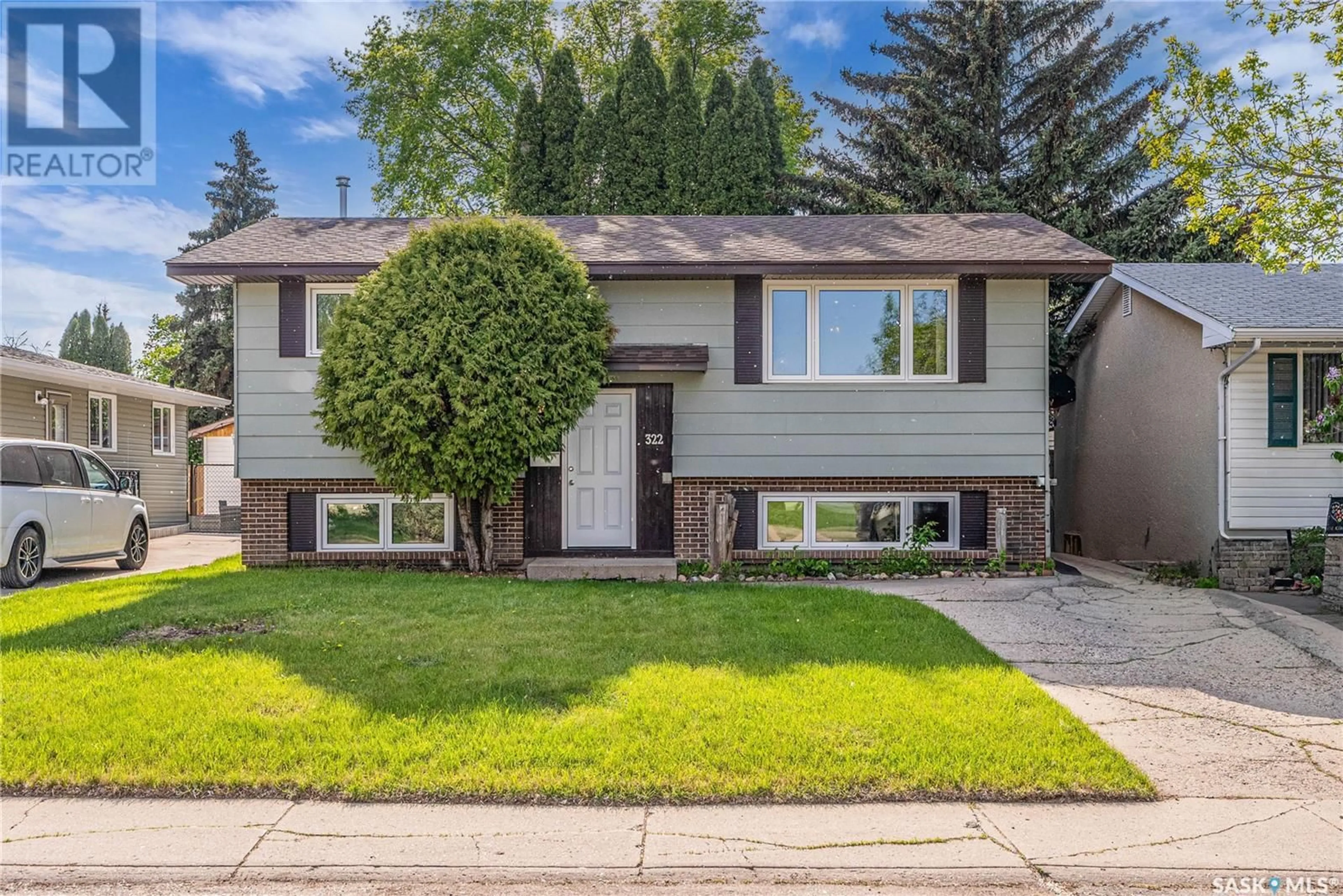 Home with vinyl exterior material, street for 322 BALSAM CRESCENT, Saskatoon Saskatchewan S7N2M1