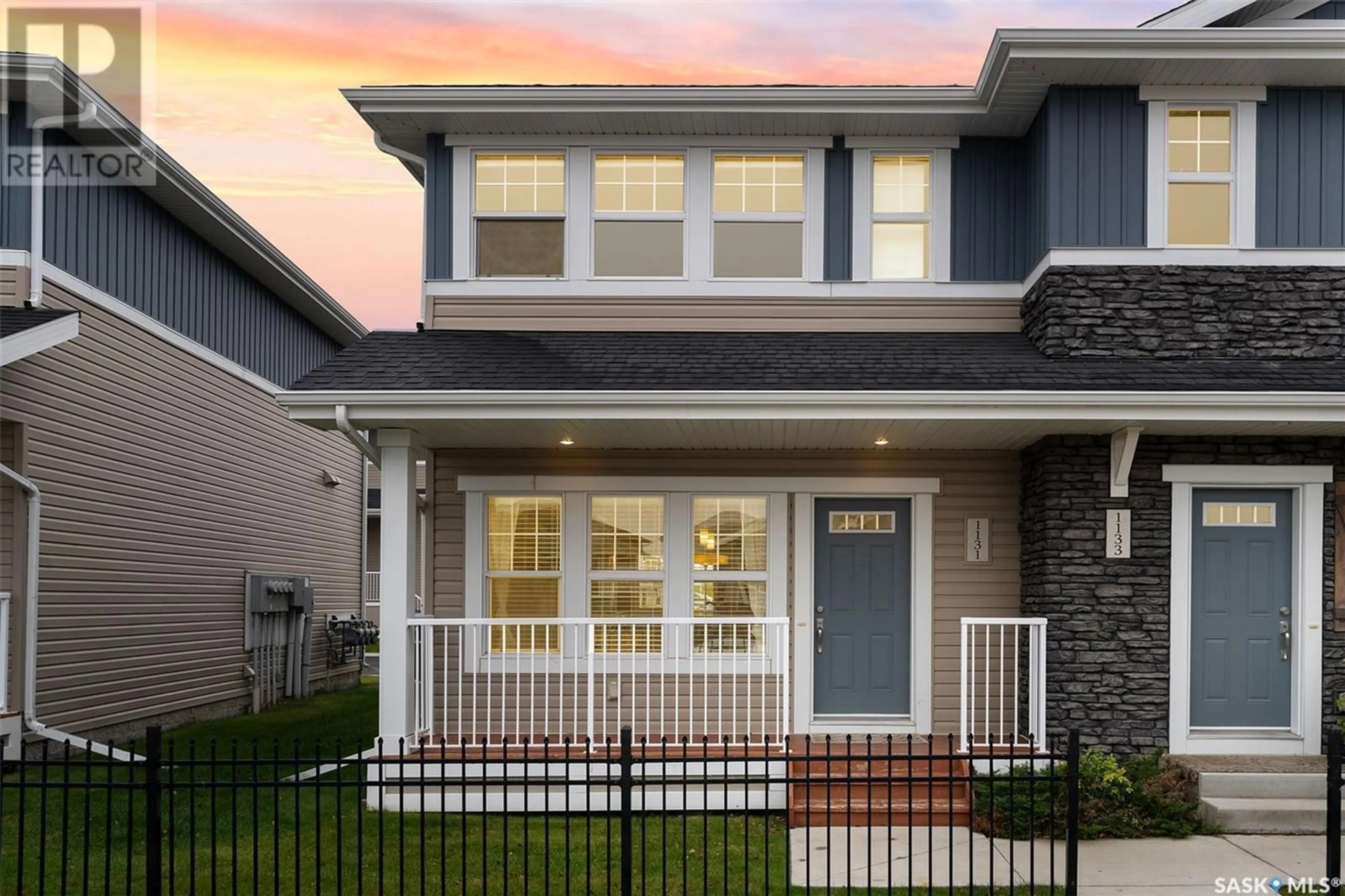 Home with vinyl exterior material, street for 1123 KOLYNCHUK LINK, Saskatoon Saskatchewan S7T0X5