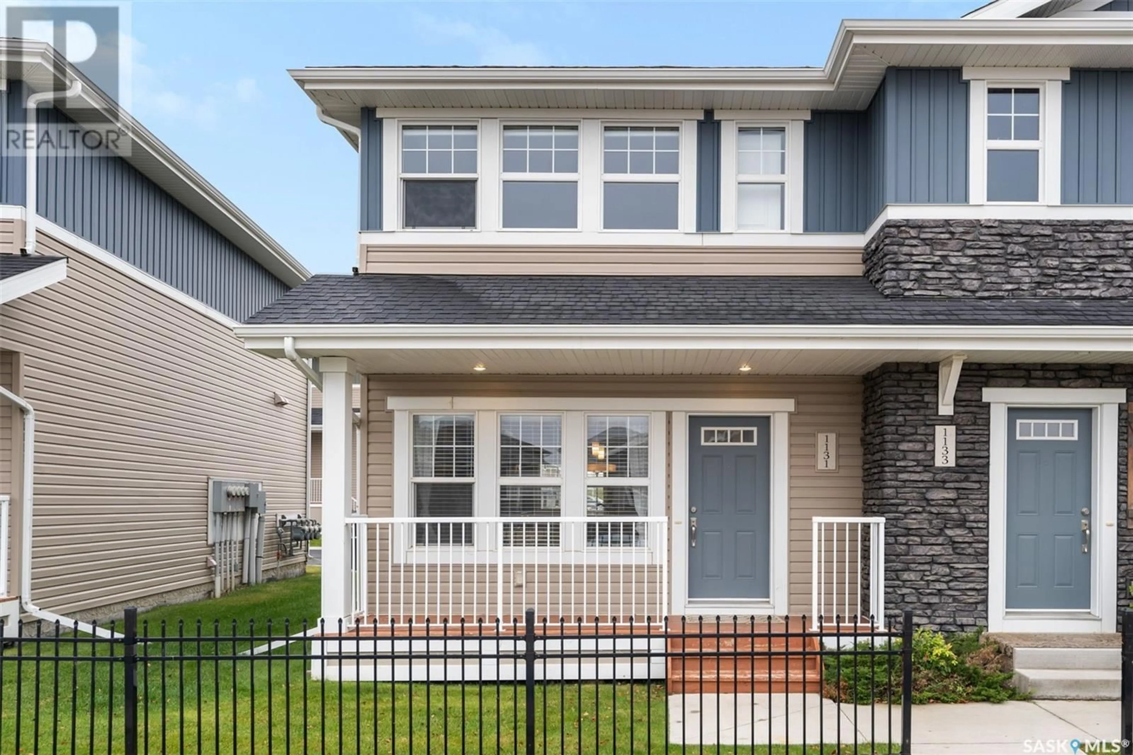 Home with vinyl exterior material, street for 1123 KOLYNCHUK LINK, Saskatoon Saskatchewan S7T0X5