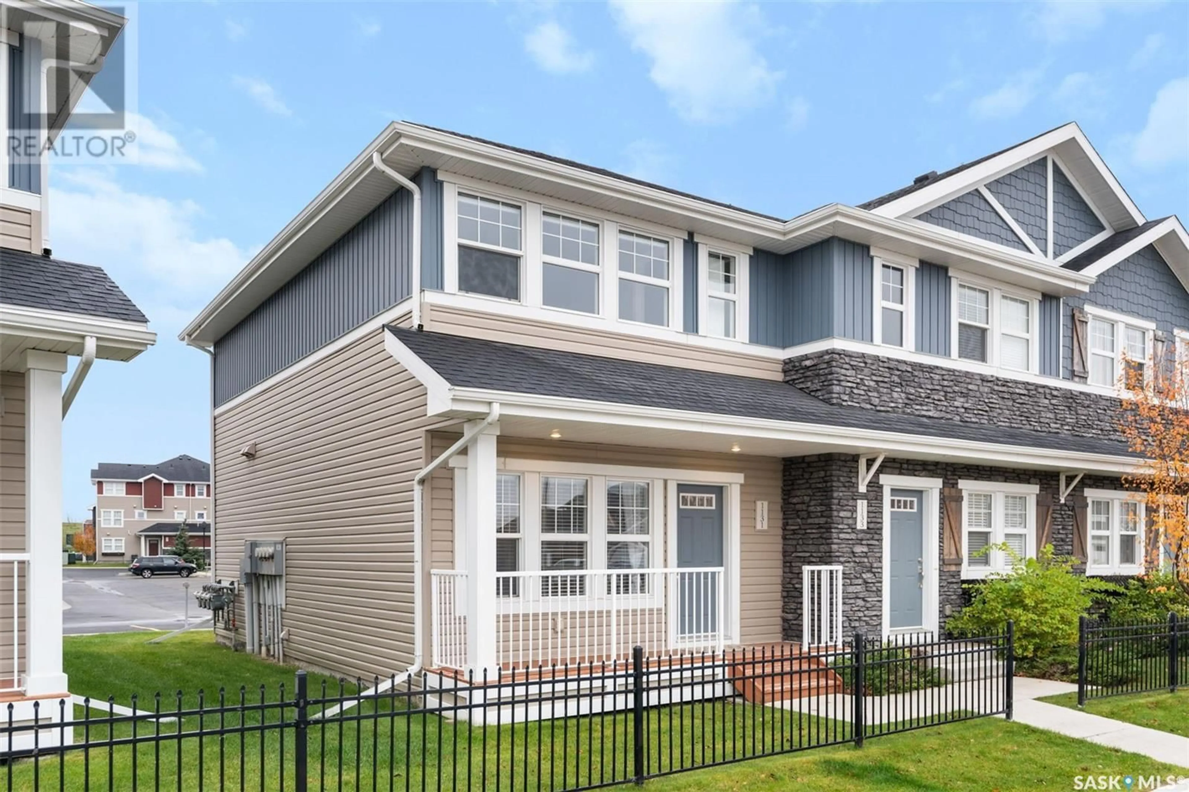 Home with vinyl exterior material, street for 1123 KOLYNCHUK LINK, Saskatoon Saskatchewan S7T0X5
