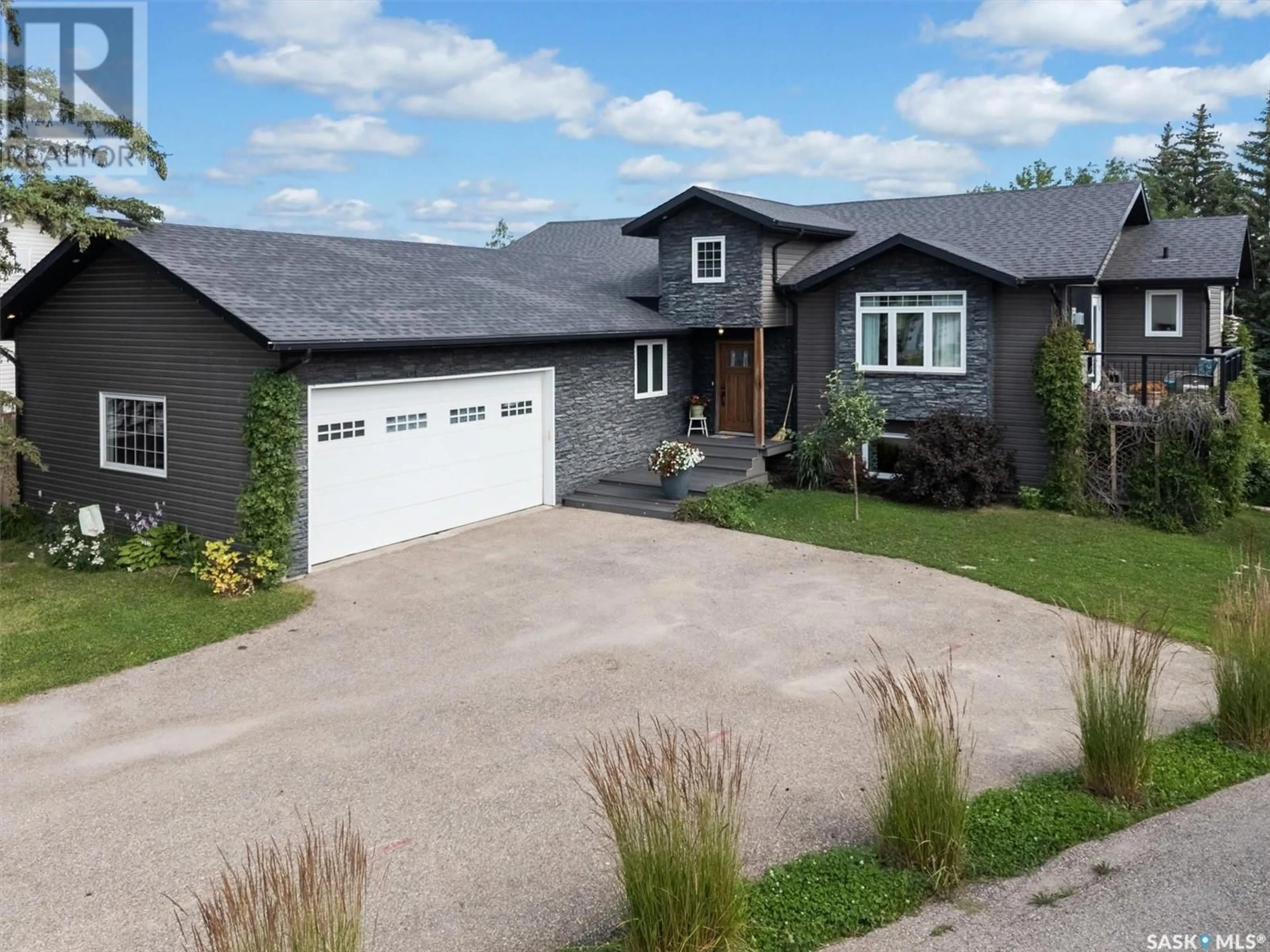 Home with vinyl exterior material, street for 101 BALMAN COURT, Waldheim Saskatchewan S0K4R0