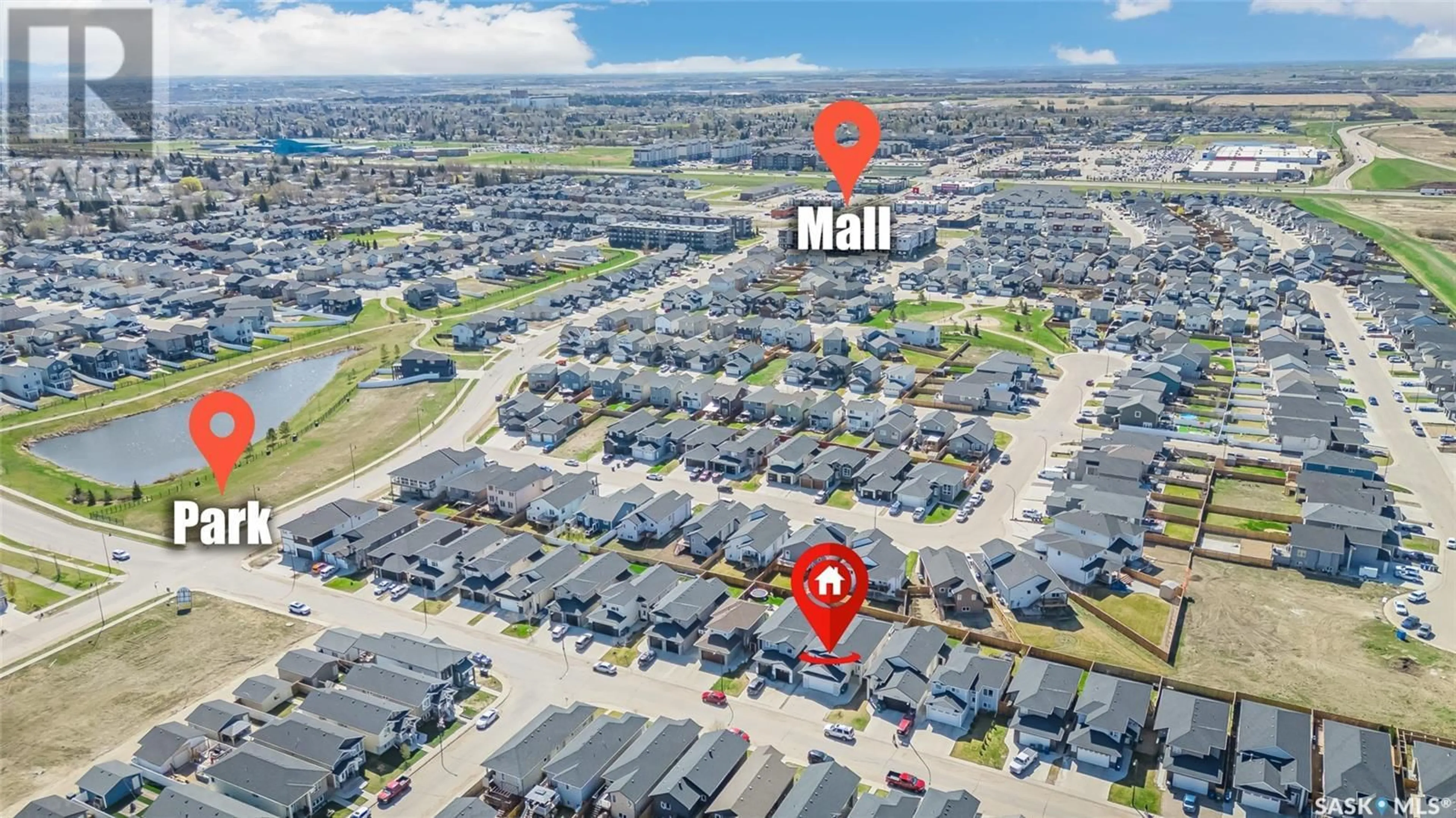 A pic from outside/outdoor area/front of a property/back of a property/a pic from drone, street for 215 ELLS CRESCENT, Saskatoon Saskatchewan S7L6J4