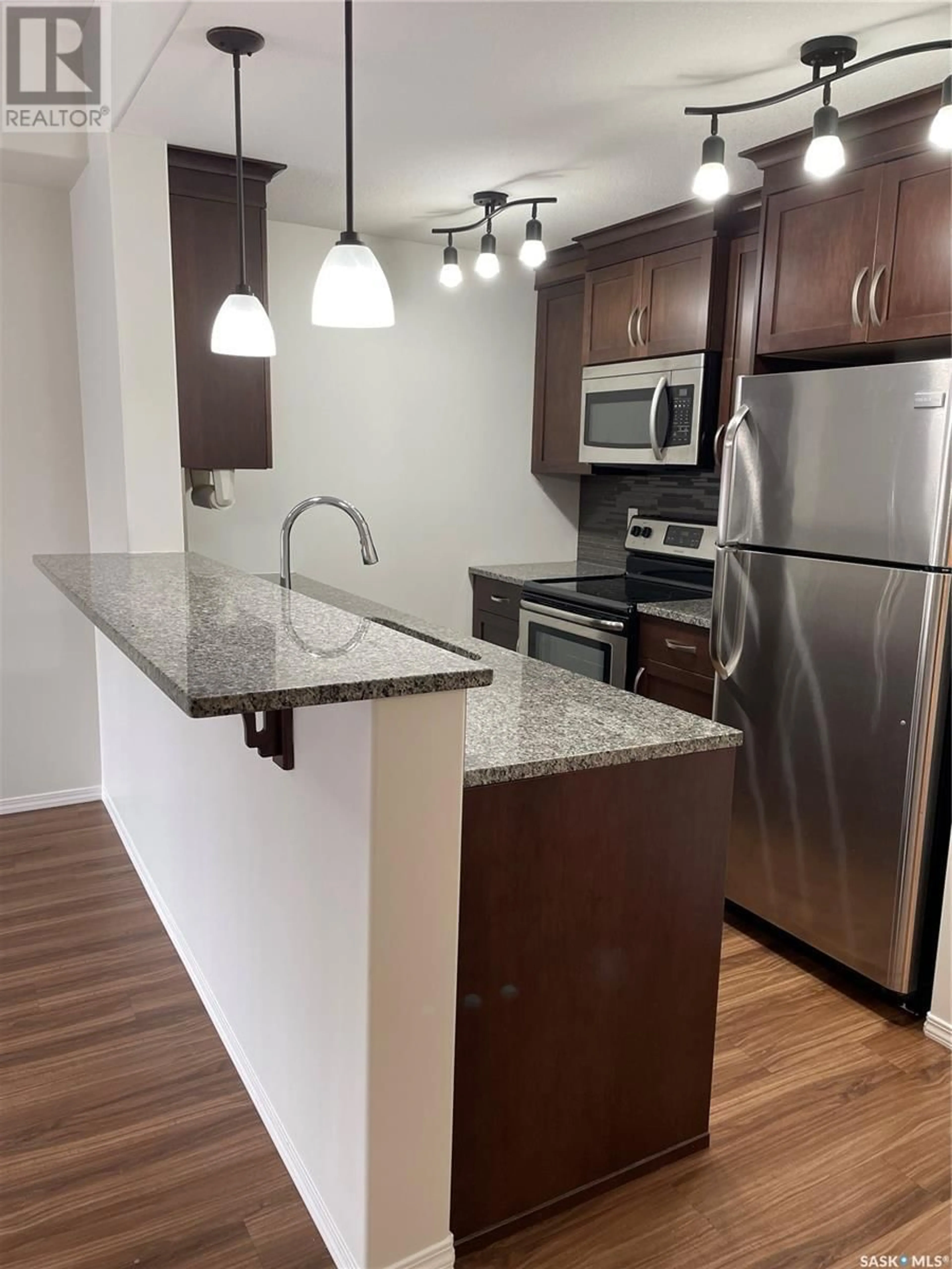 Standard kitchen, wood/laminate floor for 117 - 1220 BLACKFOOT DRIVE, Regina Saskatchewan S4S6T2