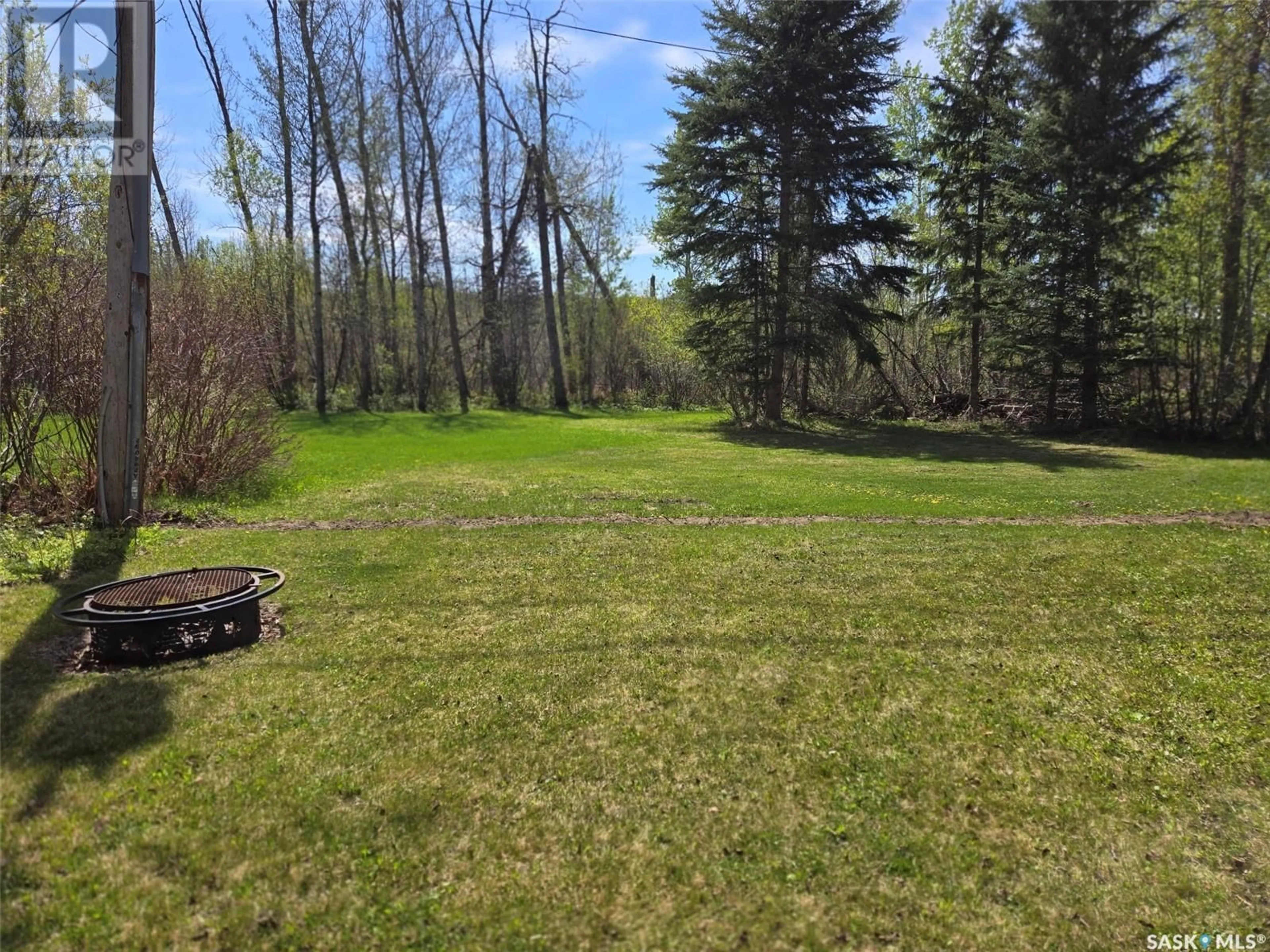 A pic from outside/outdoor area/front of a property/back of a property/a pic from drone, forest/trees view for 12 OSKUNAMOO DRIVE, Greenwater Provincial Park Saskatchewan S0A1W0