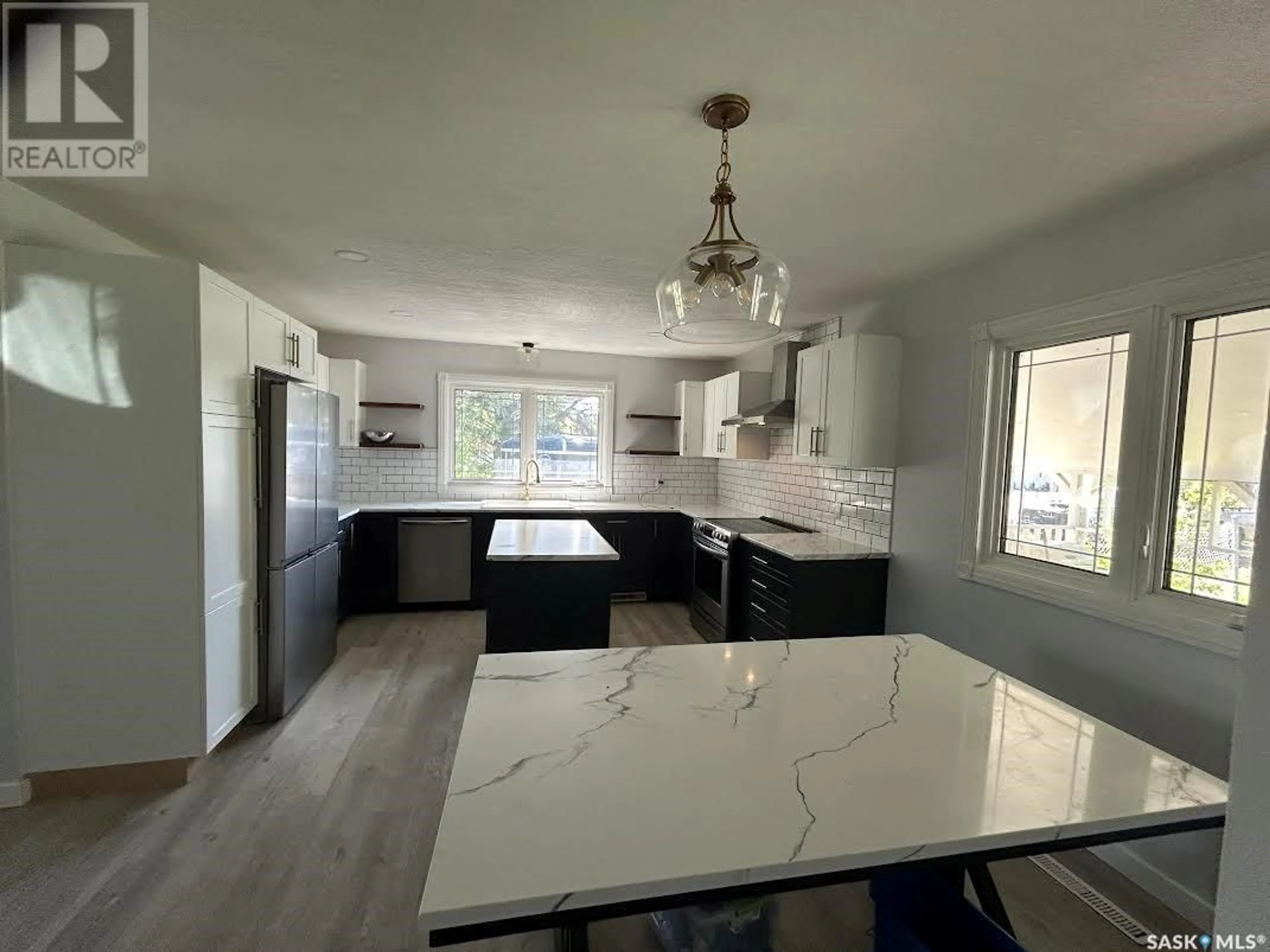 Open concept kitchen, ceramic/tile floor for 411 9TH AVENUE, Melville Saskatchewan S0A2P0