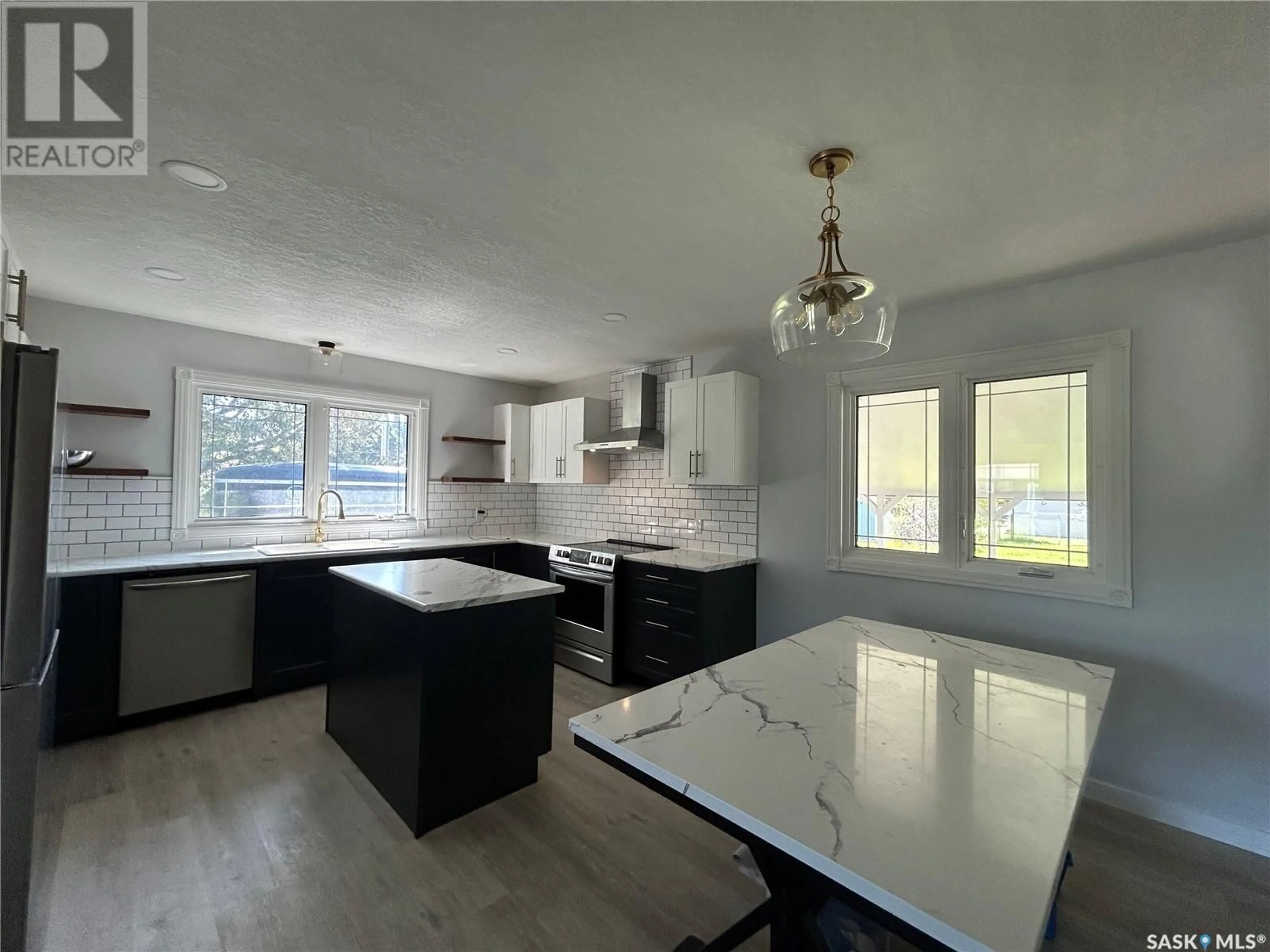 Open concept kitchen, unknown for 411 9TH AVENUE, Melville Saskatchewan S0A2P0