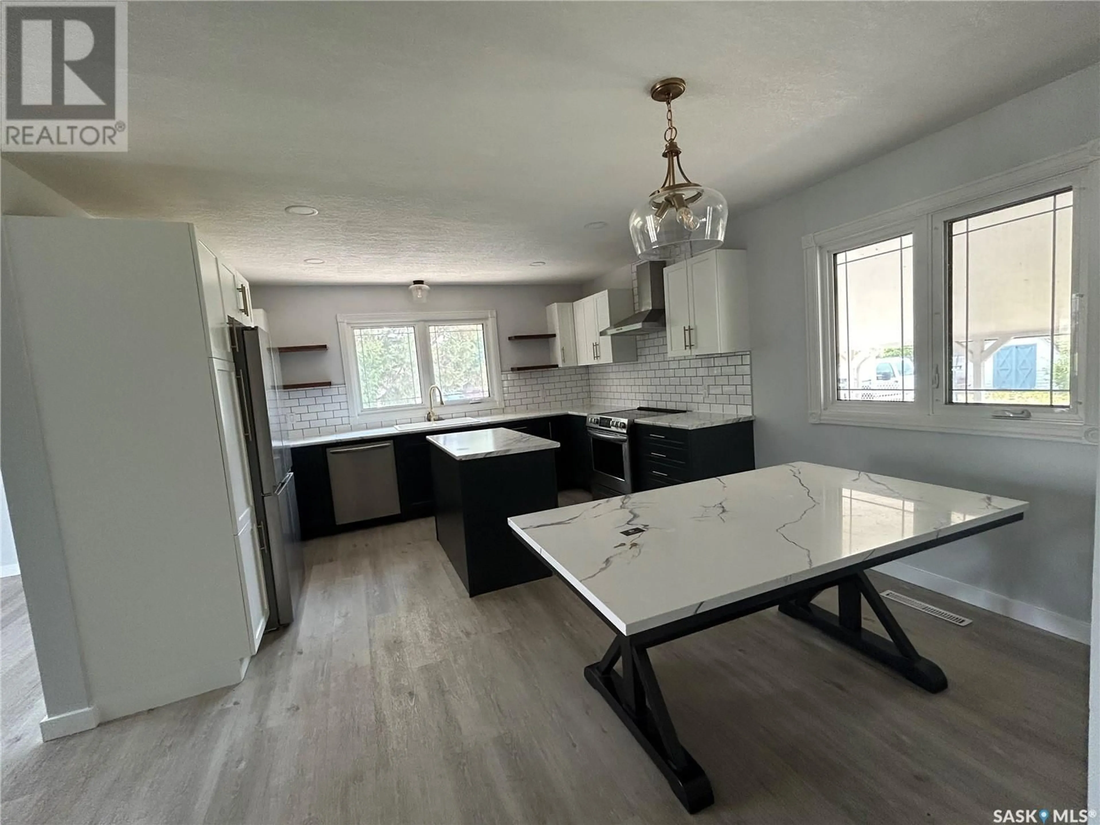 Open concept kitchen, unknown for 411 9TH AVENUE, Melville Saskatchewan S0A2P0