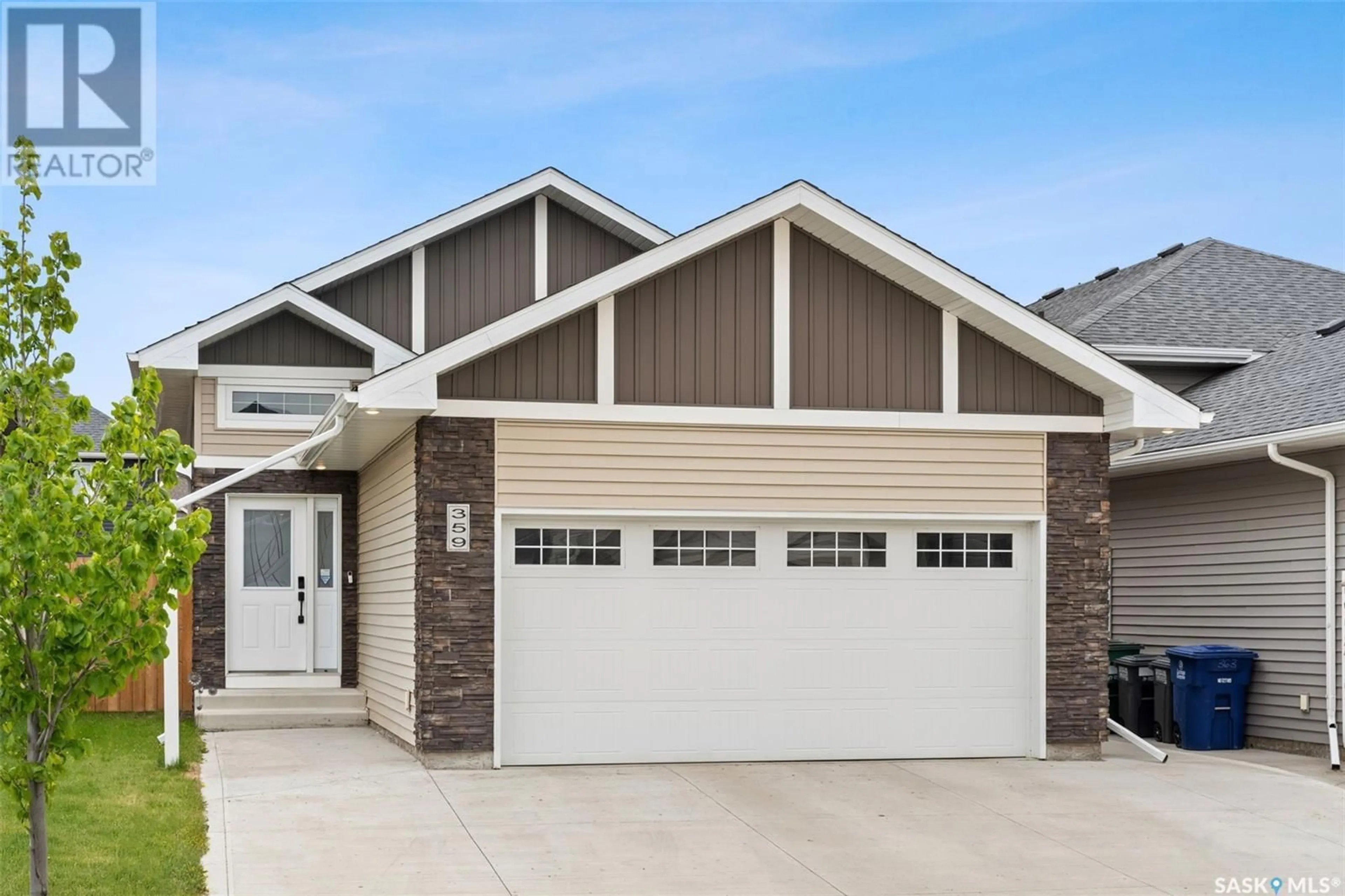Home with vinyl exterior material, street for 359 KOLYNCHUK MANOR, Saskatoon Saskatchewan S7T0W4