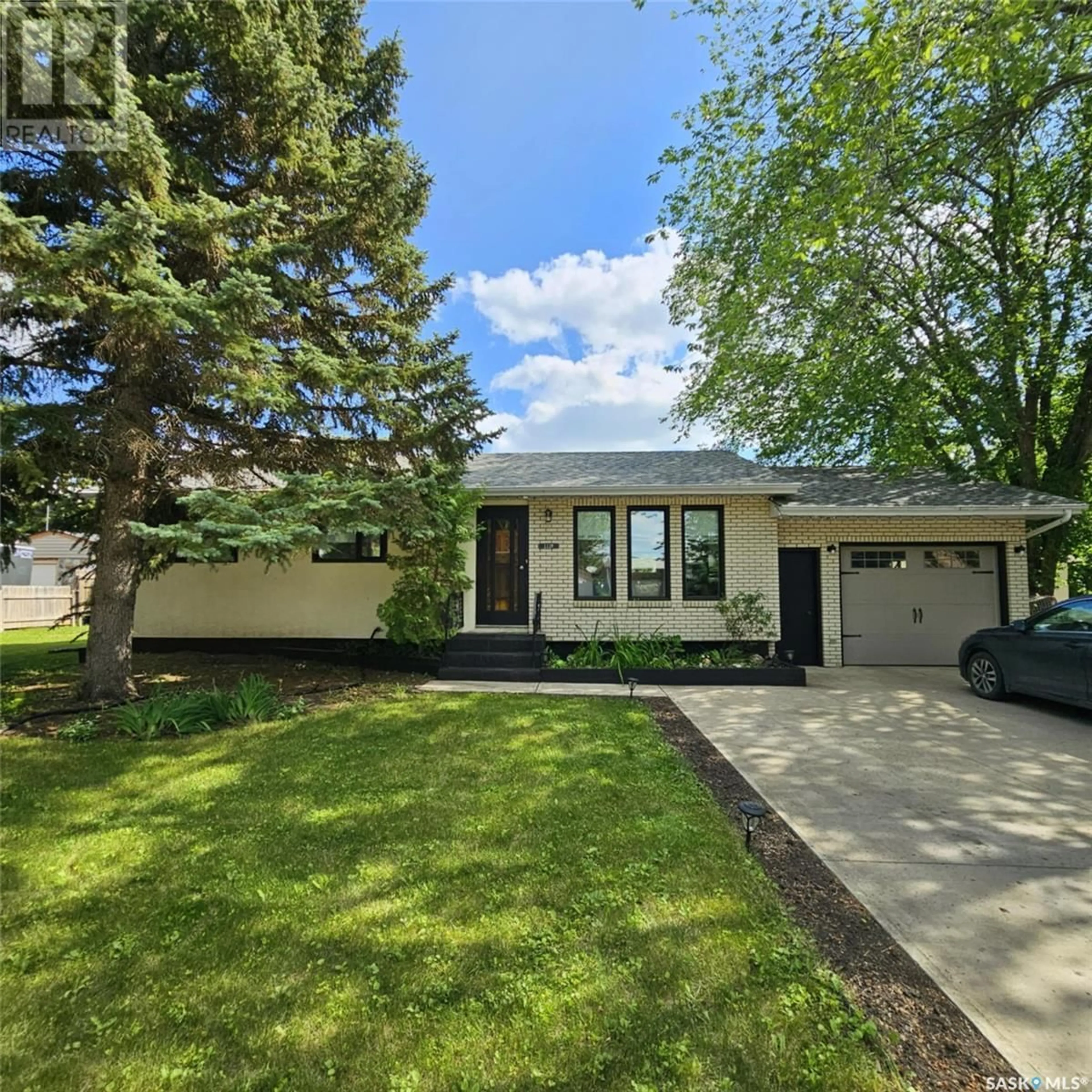 Home with vinyl exterior material, street for 1119 ASQUITH DRIVE, Esterhazy Saskatchewan S0A0X0