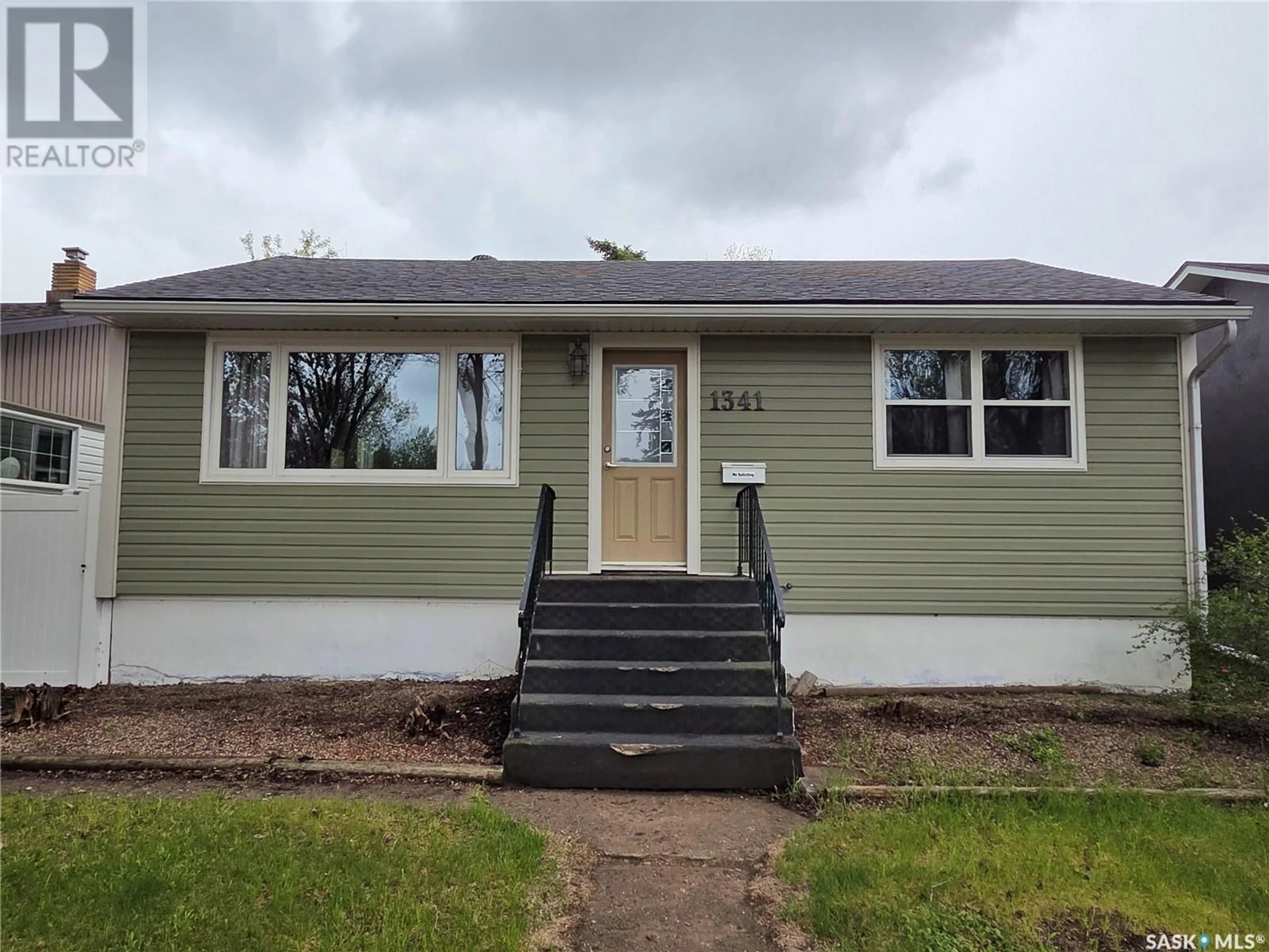 Home with vinyl exterior material, street for 1341 HORACE STREET, Regina Saskatchewan S4T5L7