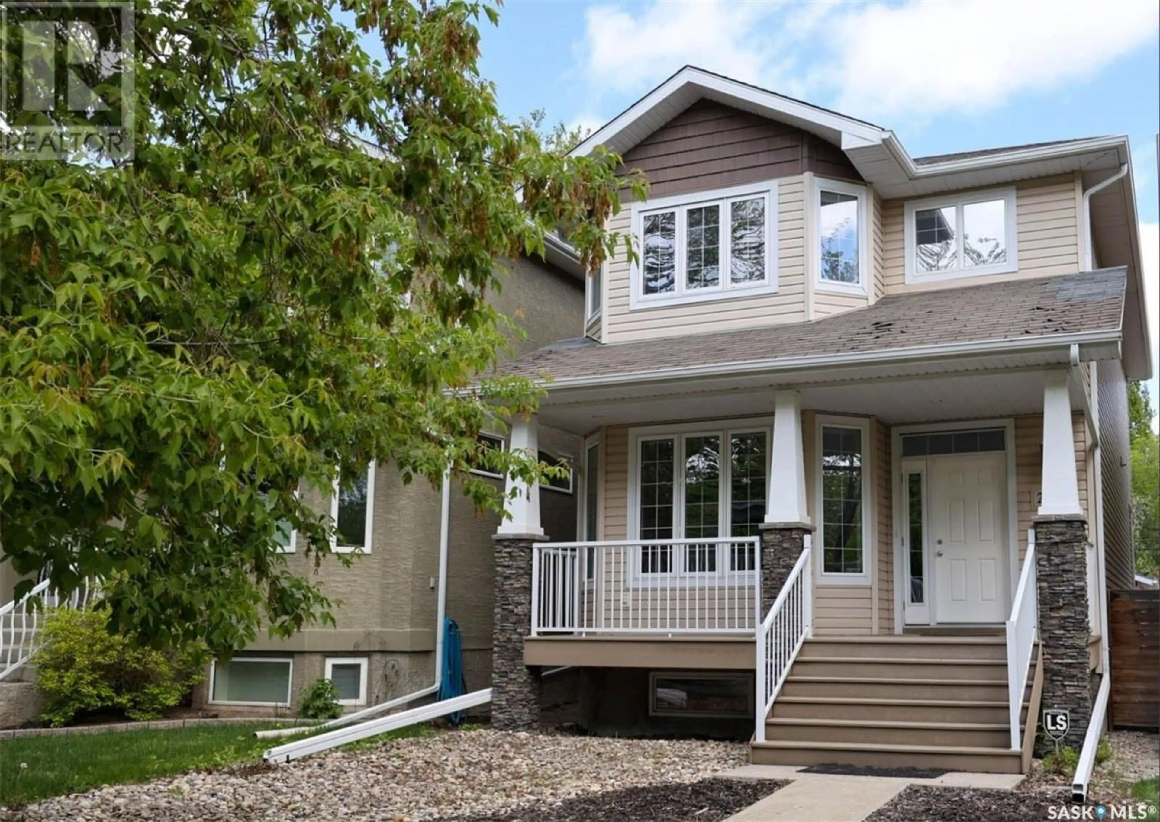 Home with vinyl exterior material, street for 2269 RETALLACK STREET, Regina Saskatchewan S4T2K7