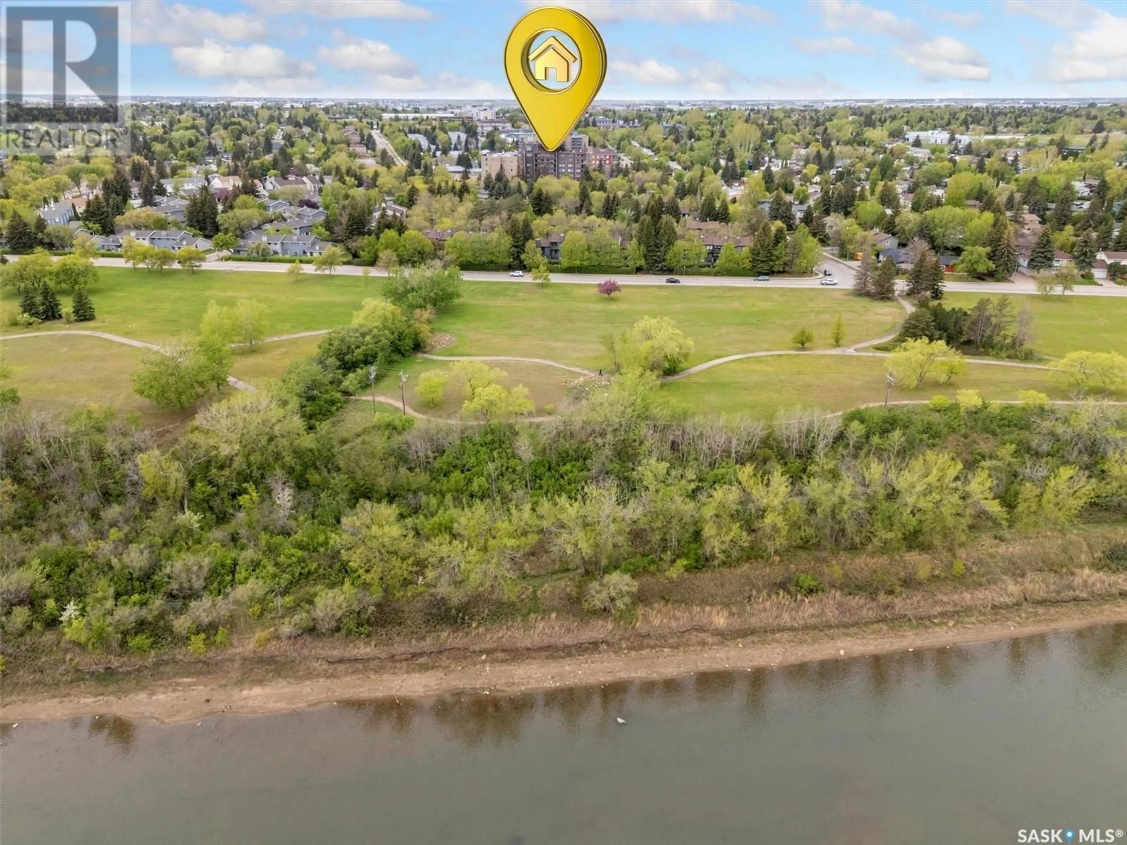 A pic from outside/outdoor area/front of a property/back of a property/a pic from drone, water/lake/river/ocean view for 107 - 351 SAGUENAY DRIVE, Saskatoon Saskatchewan S7K5T4
