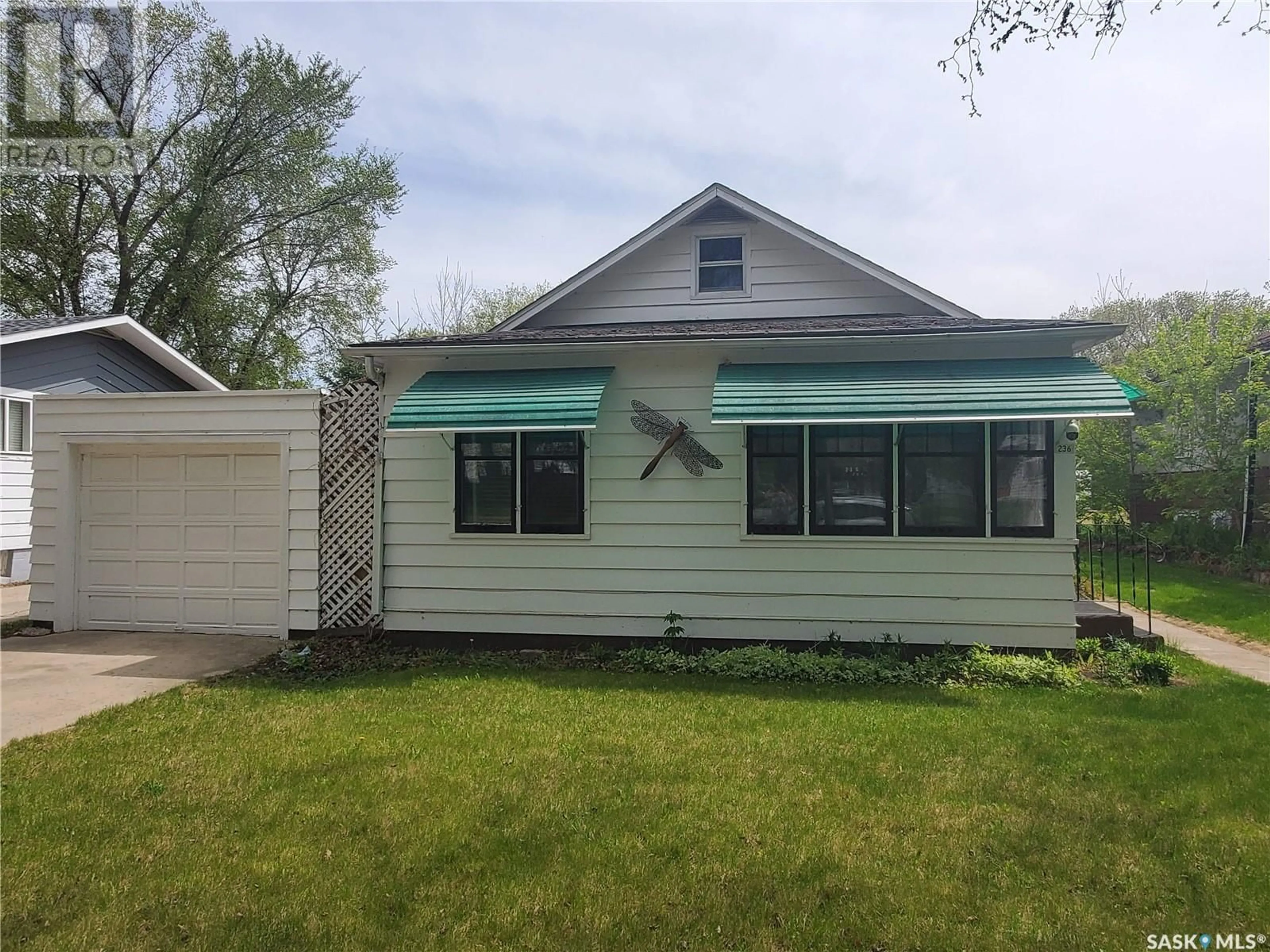 Home with vinyl exterior material, street for 236 THIRD AVENUE, Kamsack Saskatchewan S0A1S0